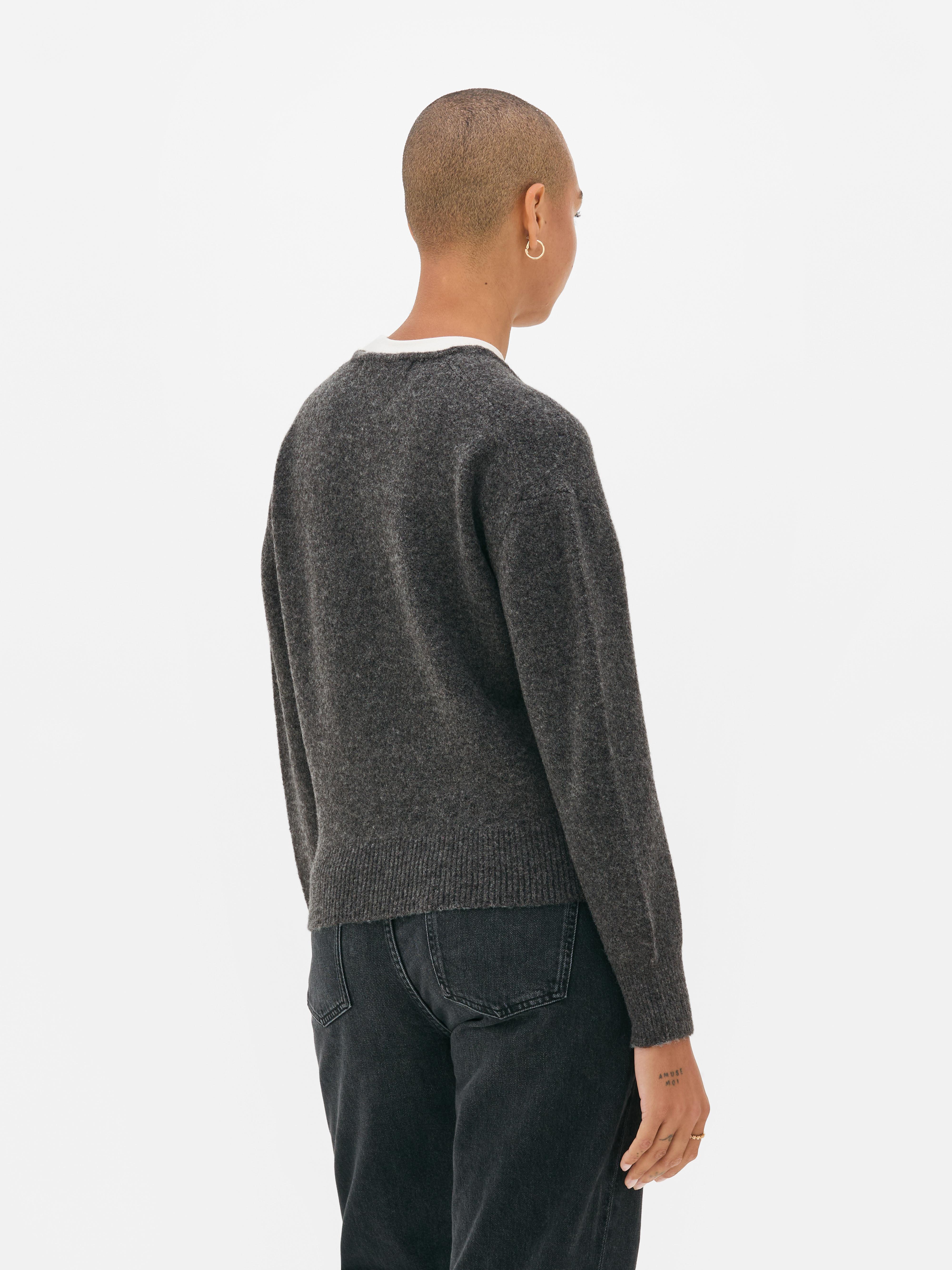 Pull cache-cœur à col en V