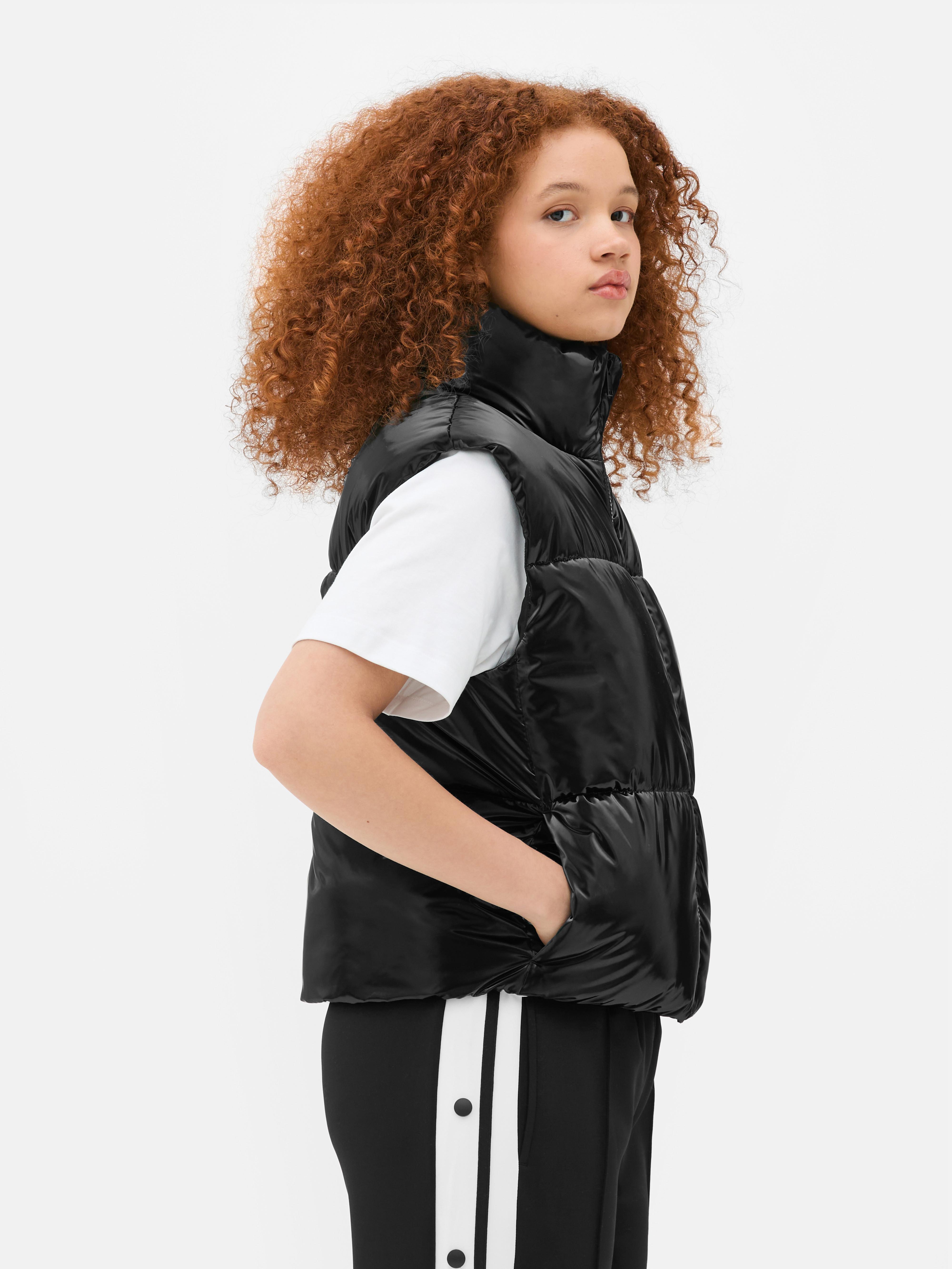 Glanzende bodywarmer Colleen Atwood X Wednesday