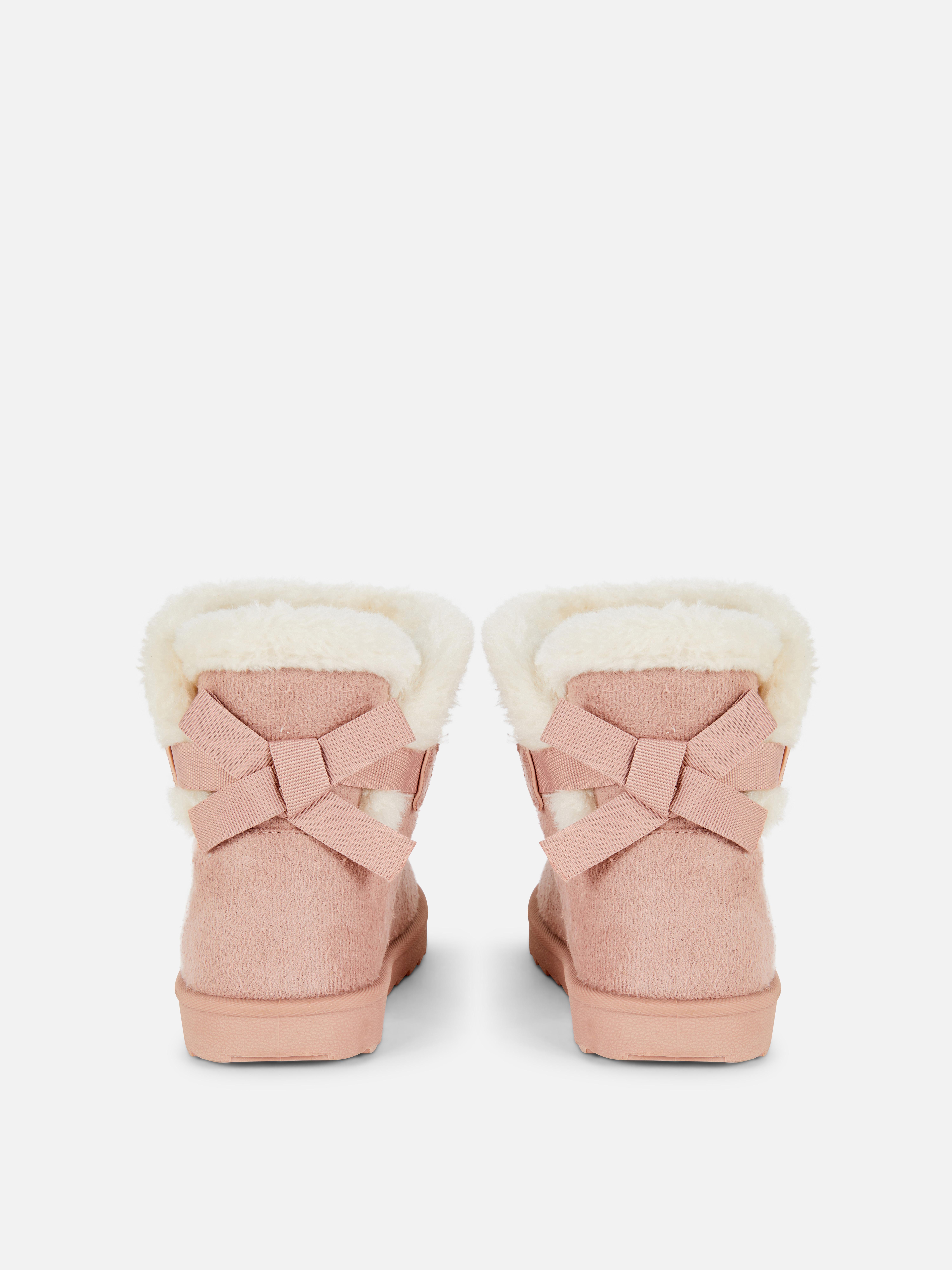 Bottines douillettes à nœud arrière