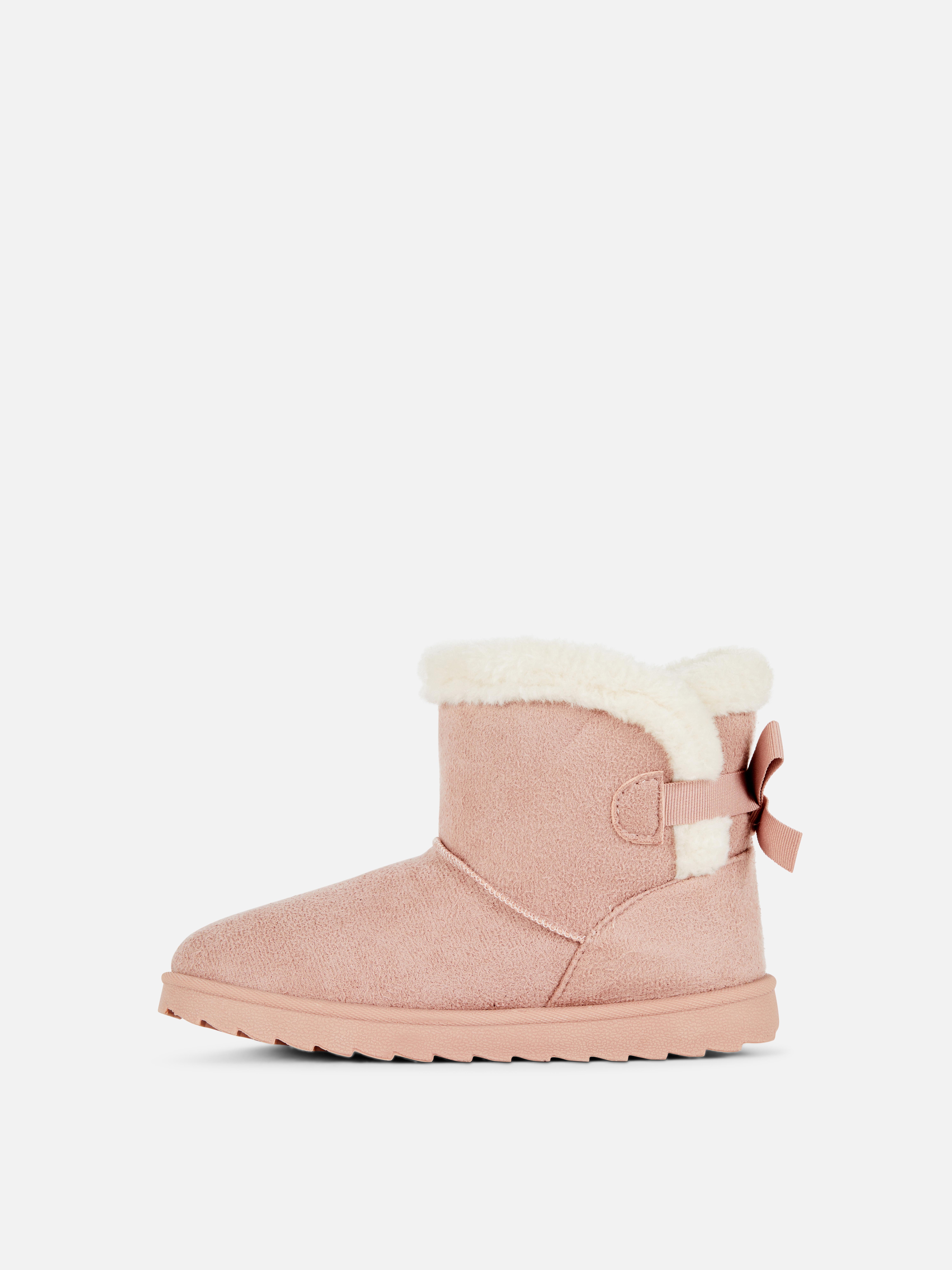 Bottines douillettes à nœud arrière