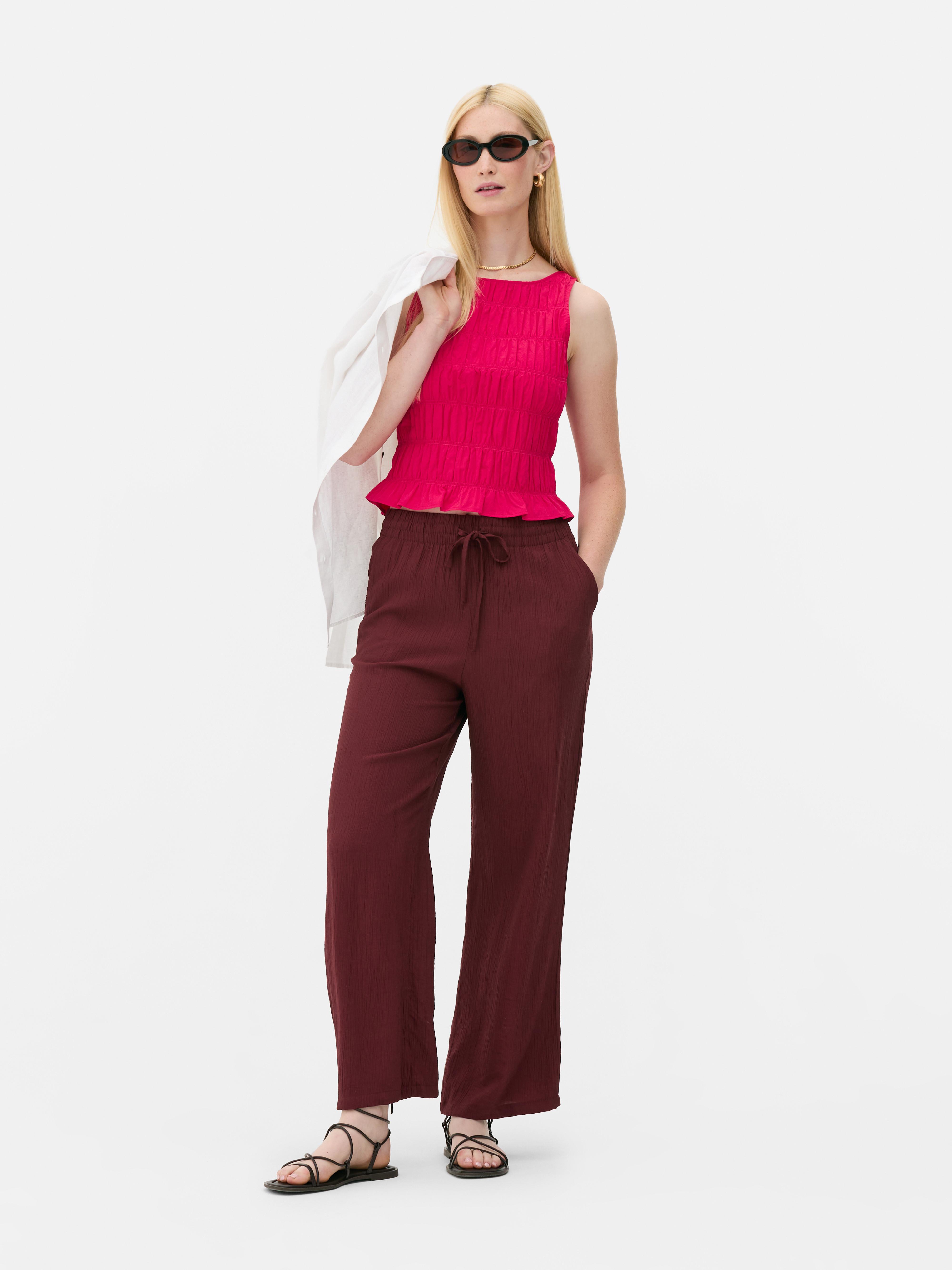 Top smanicato arricciato