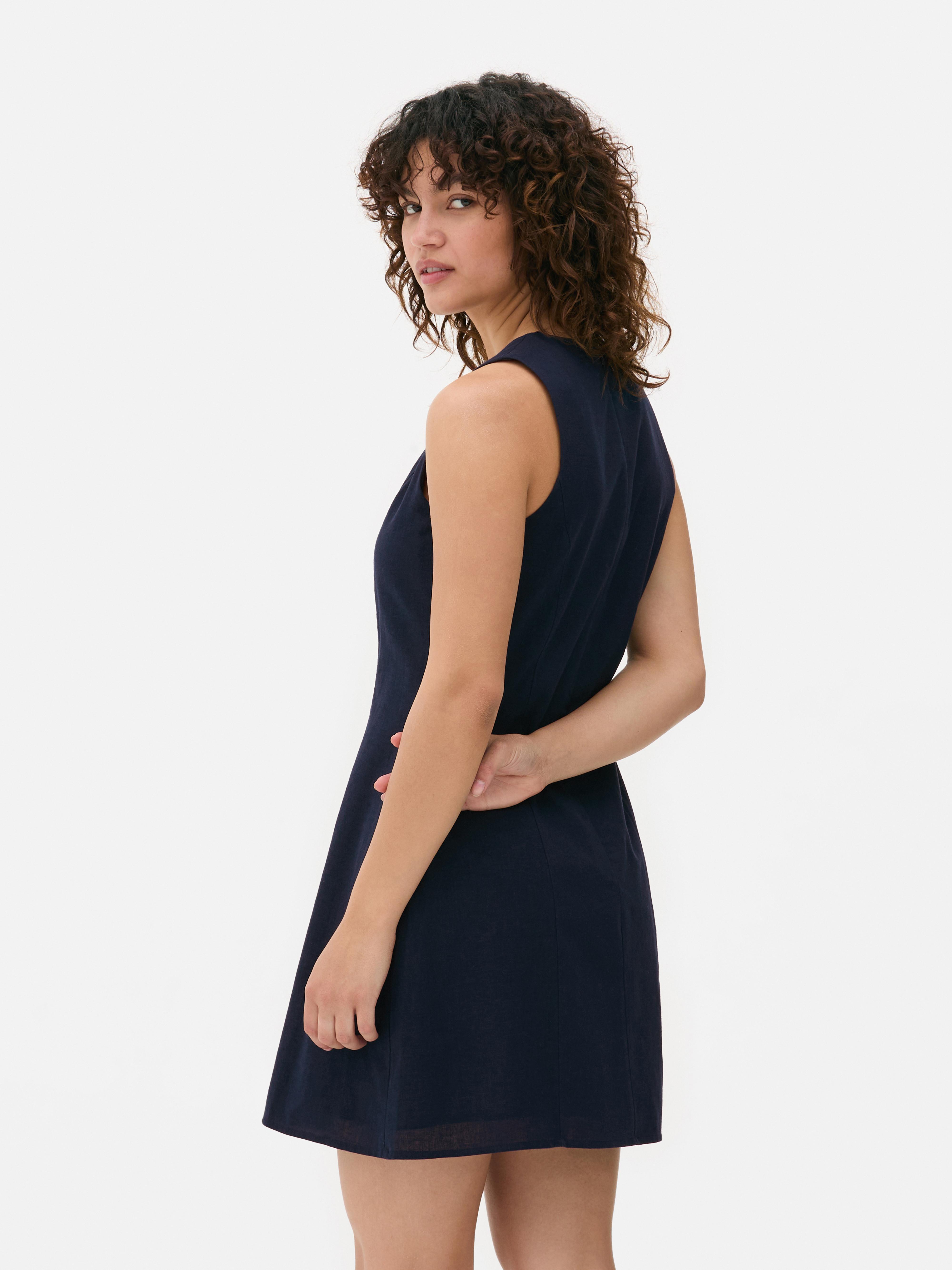 Vestido mini sem mangas laço frente