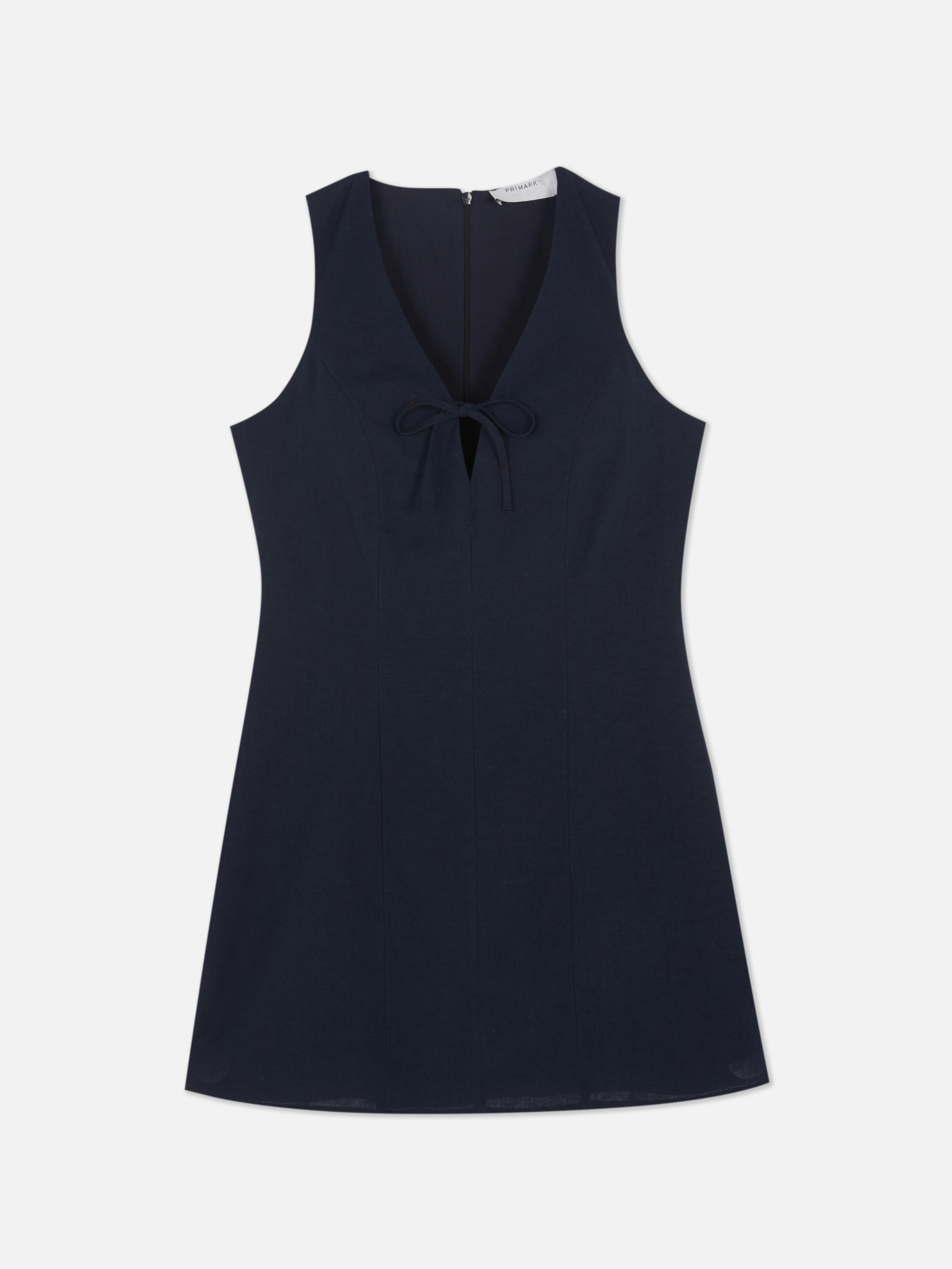 Vestido mini sem mangas laço frente