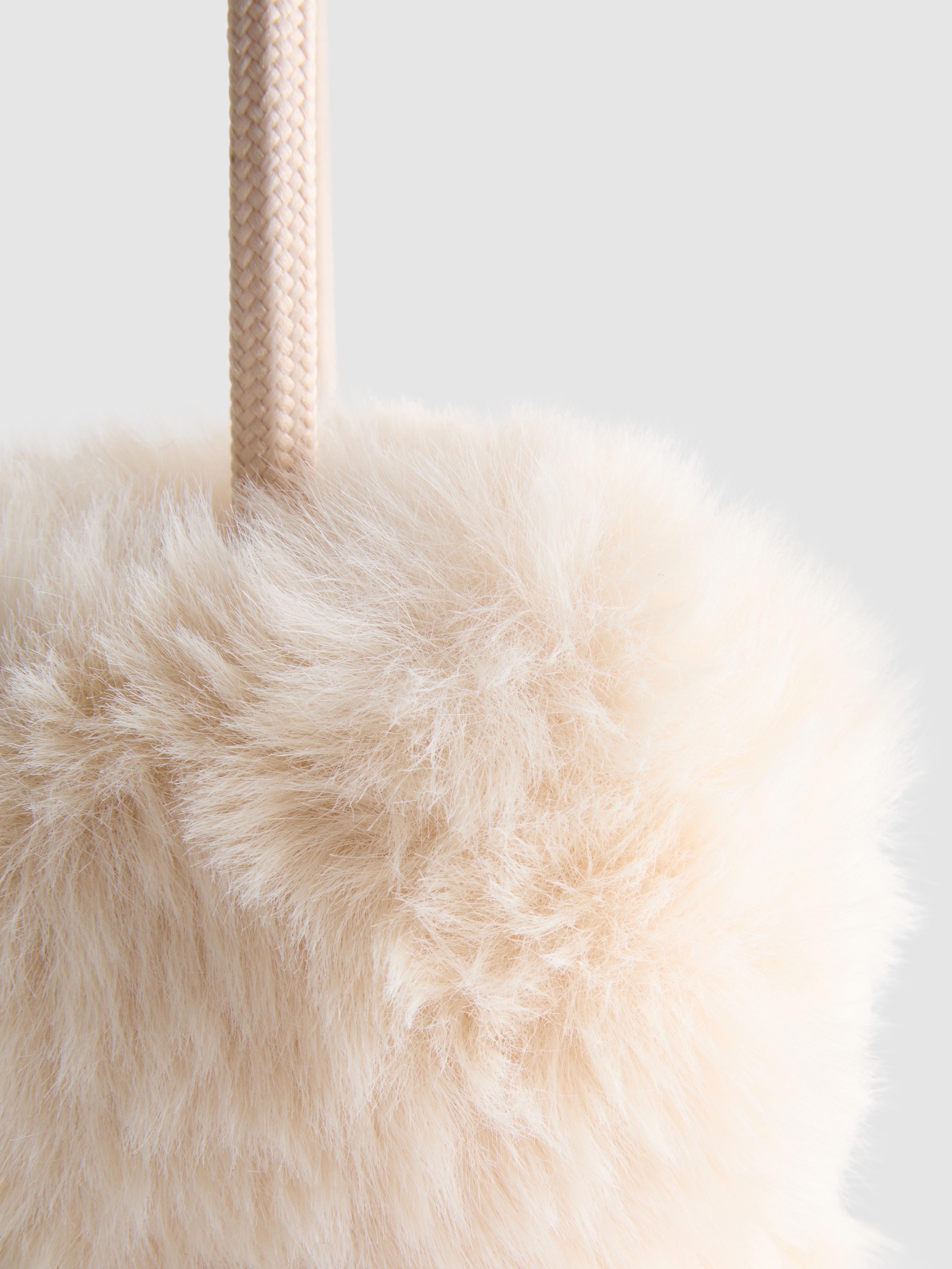 Cache-oreilles en fausse fourrure