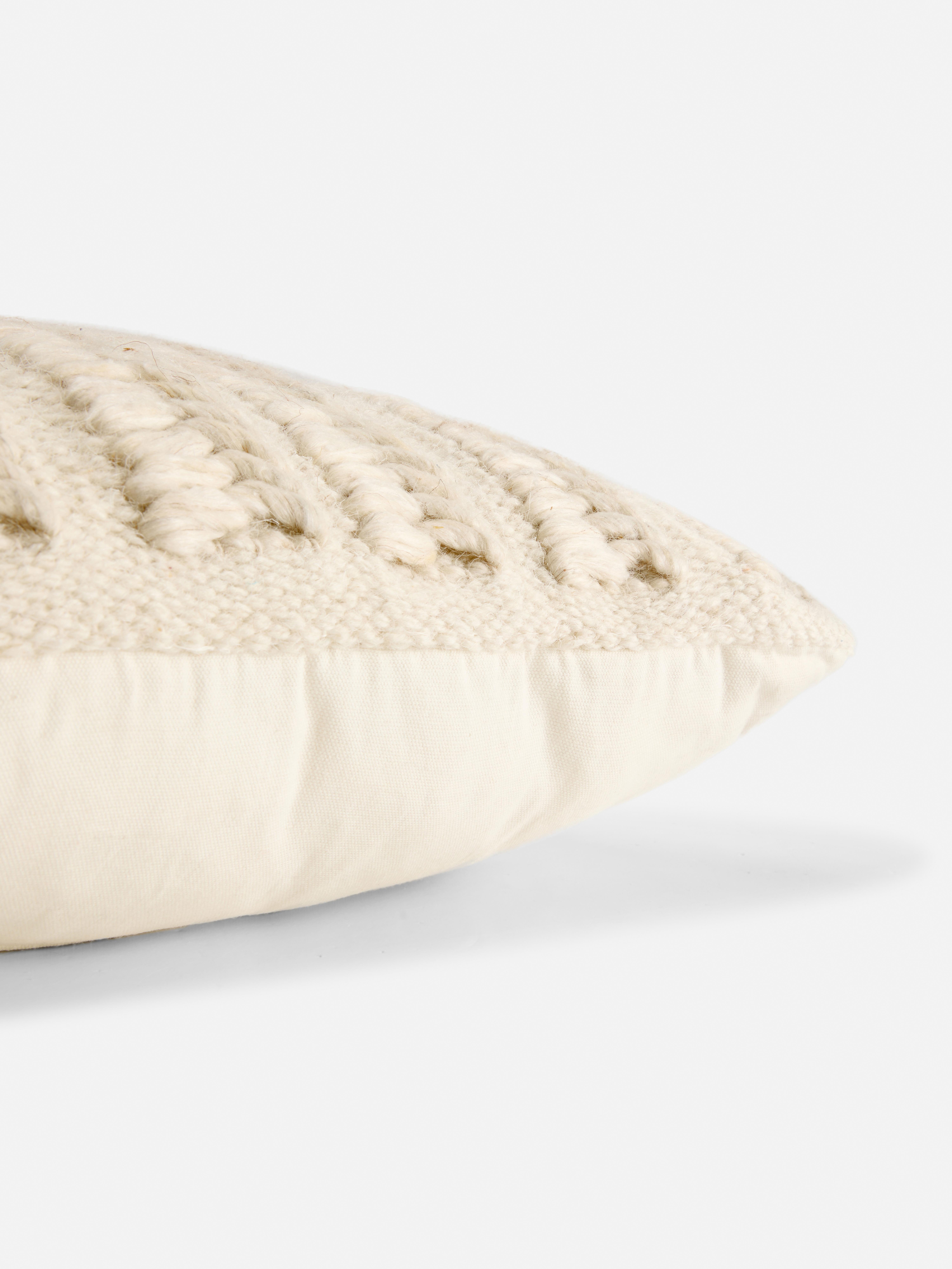 Coussin carré tressé
