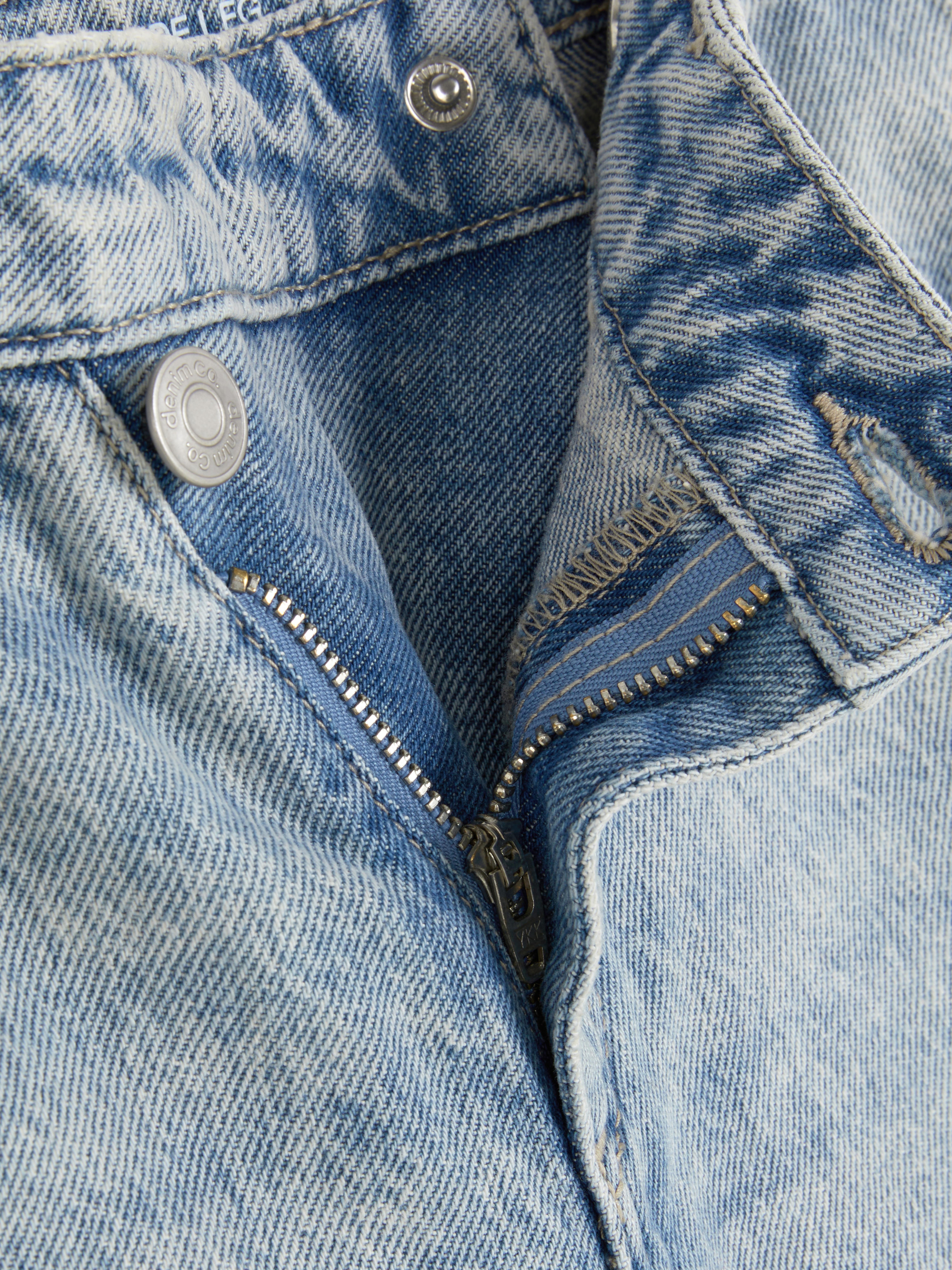 7-15 jr | Jeans met gekruiste taille en wijde pijpen