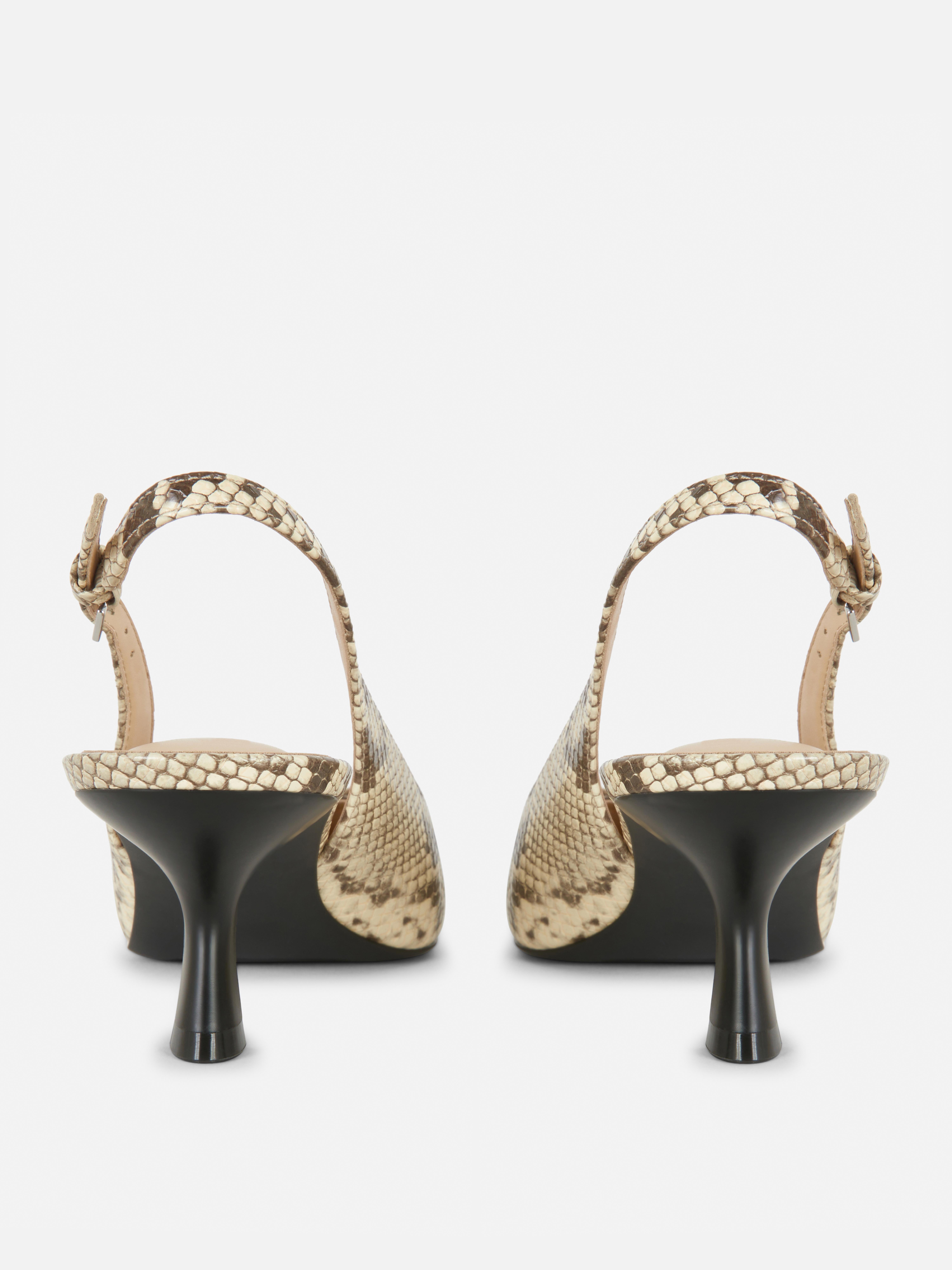 Scarpe aperte sul tallone a punta con tacco