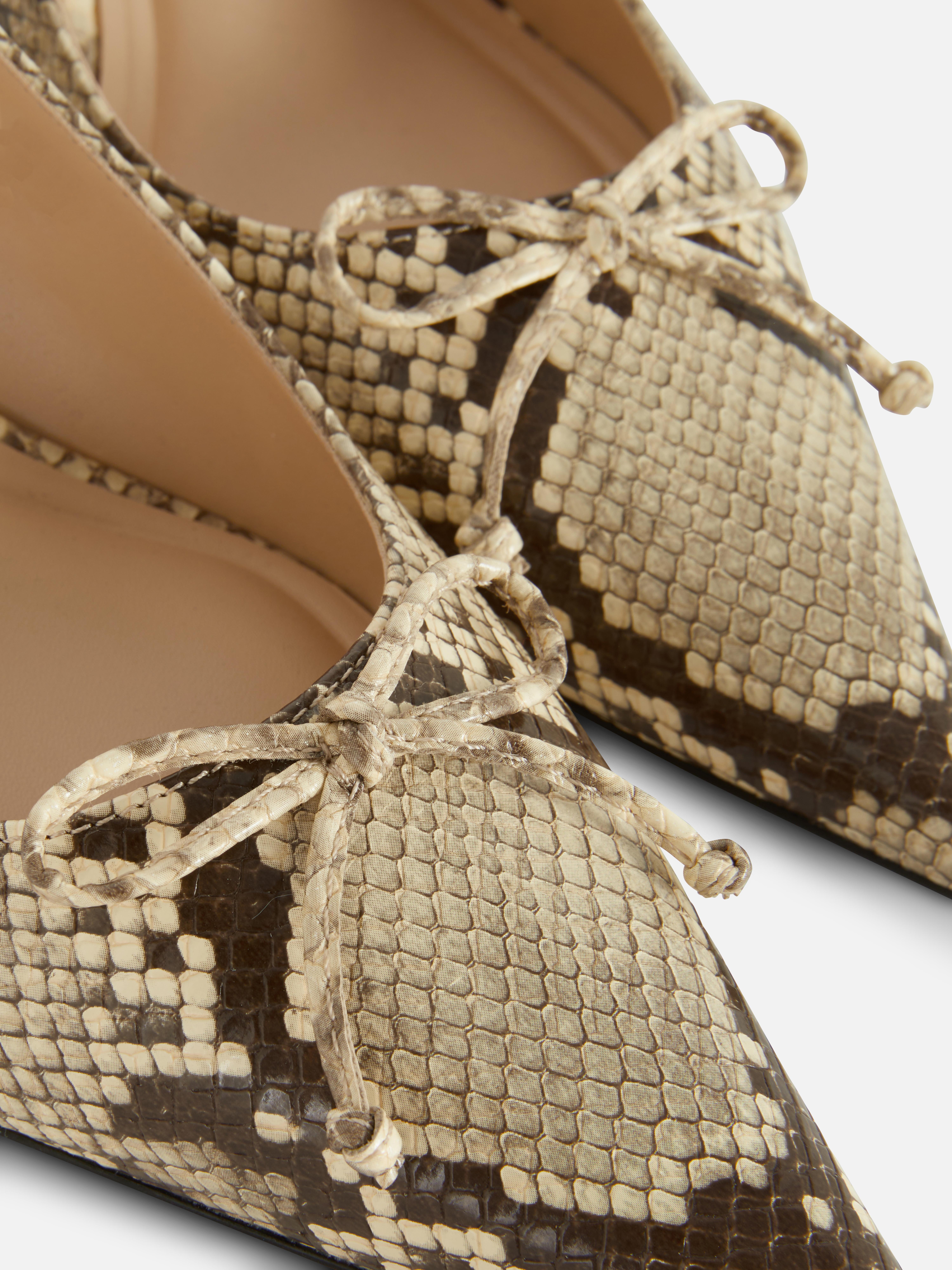 Scarpe aperte sul tallone a punta con tacco