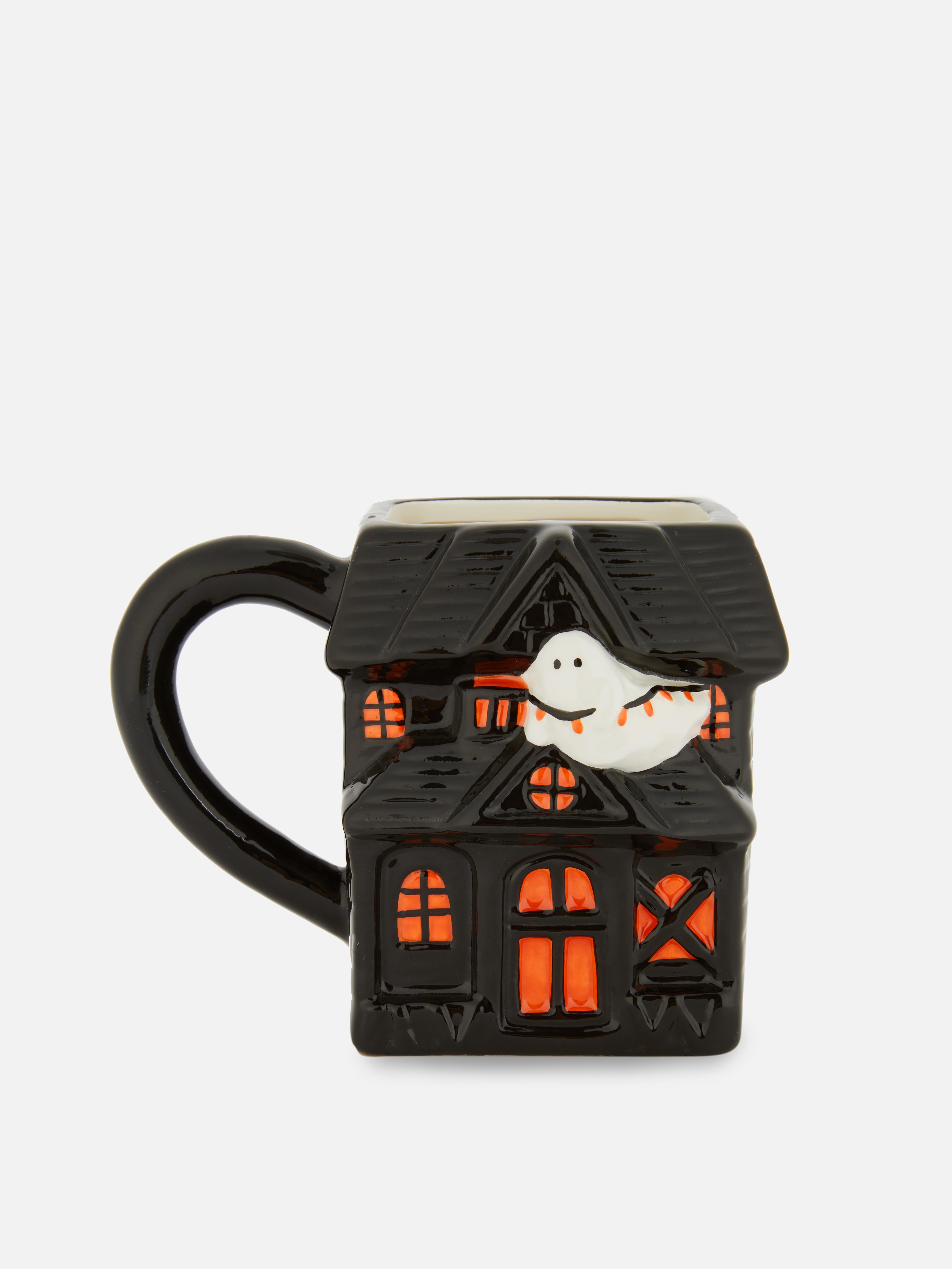 Tasse in Form eines Spukhauses