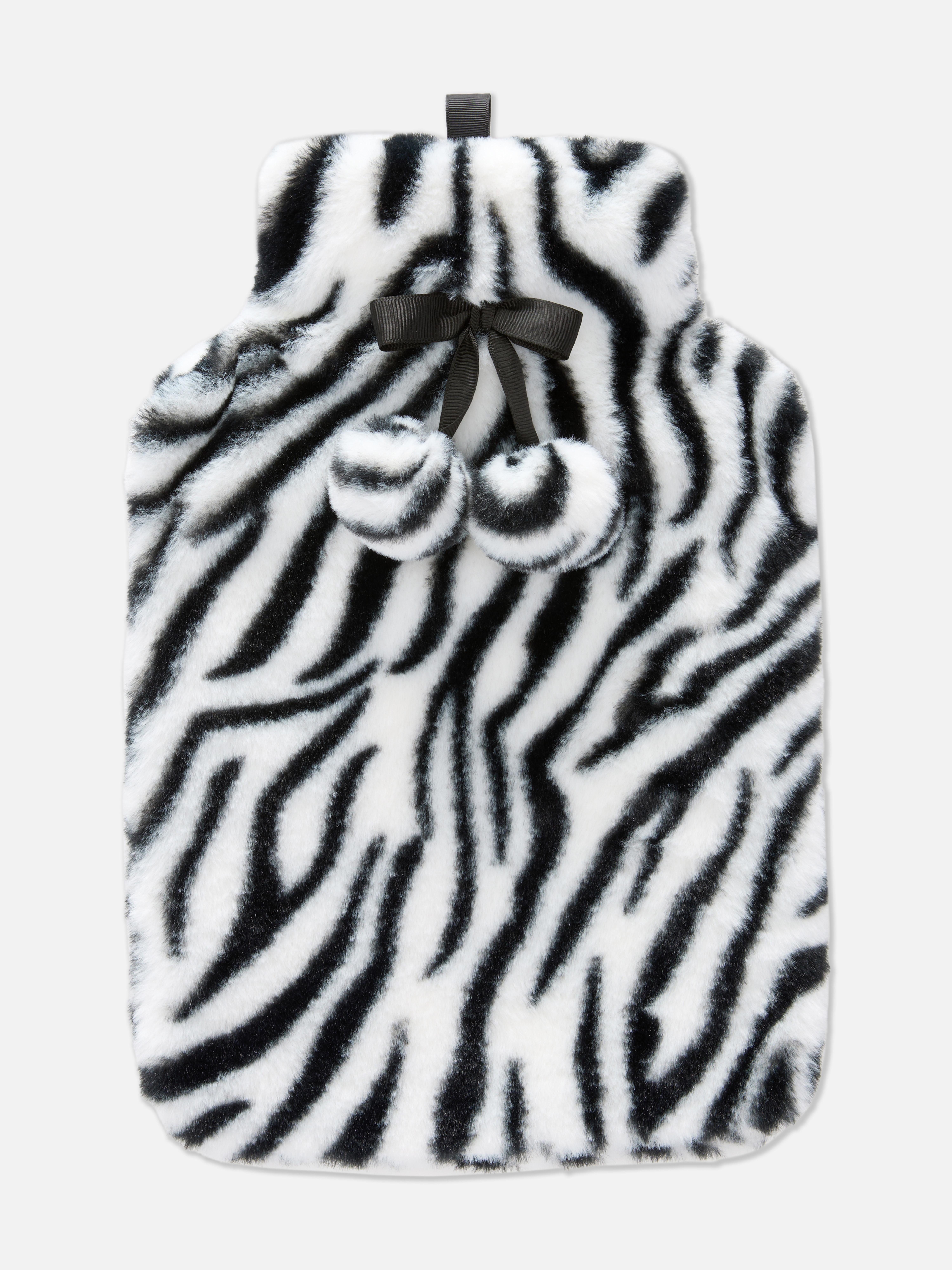 Bouillotte dans une housse à motifs