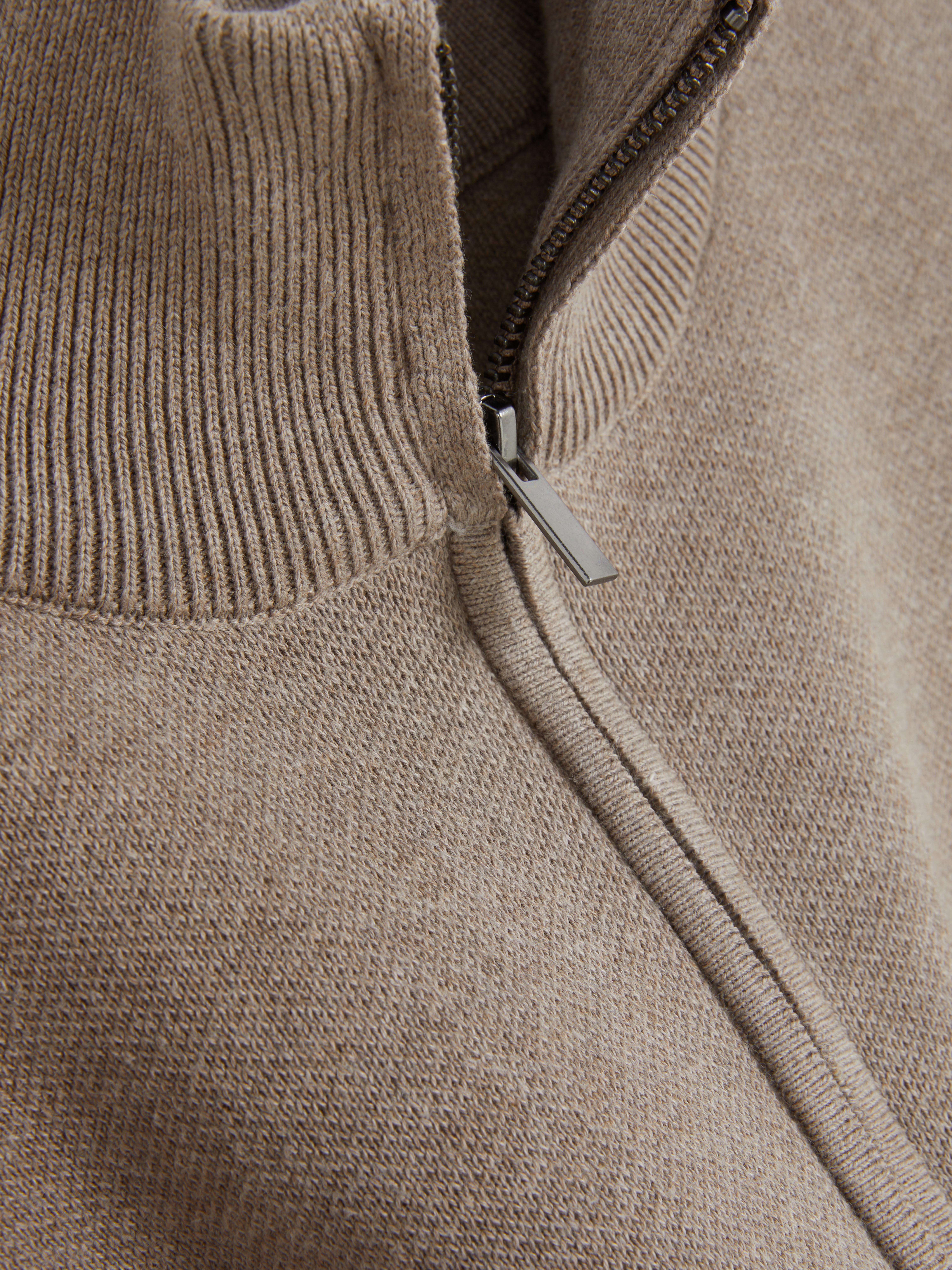 Pull à col cheminée zippé