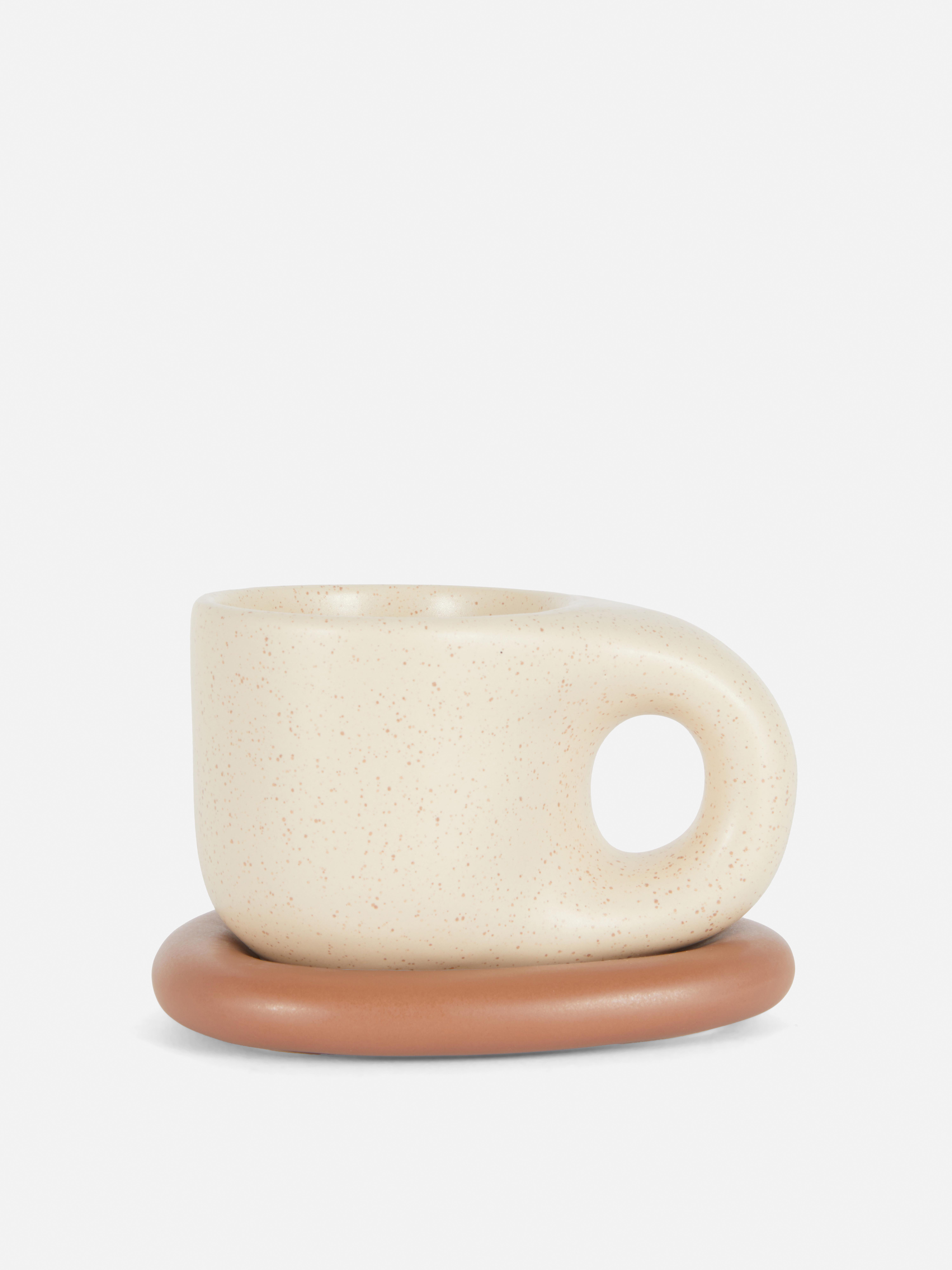 Tasse et soucoupe à émaillage coulant