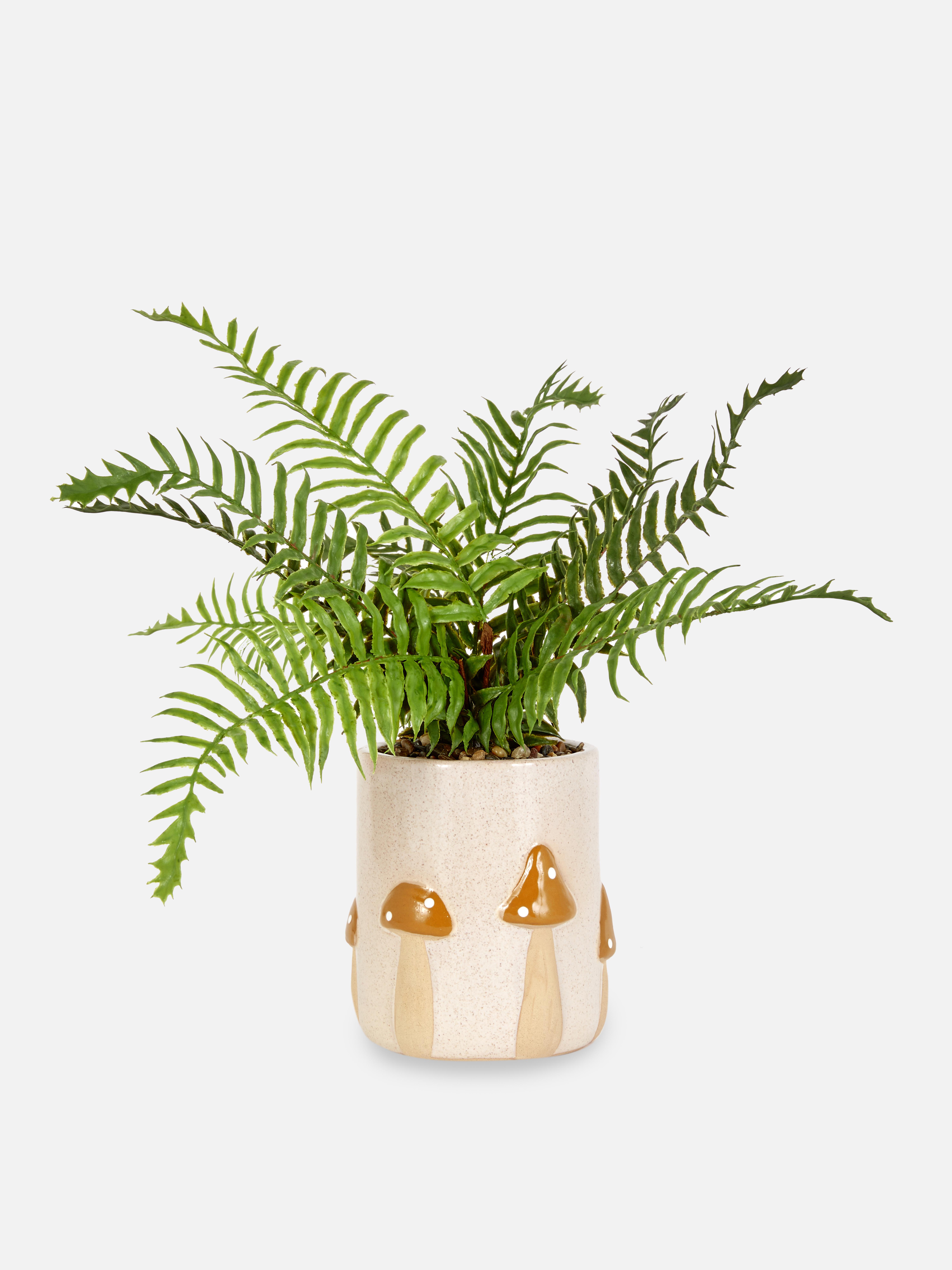 Fausse plante dans un pot en céramique