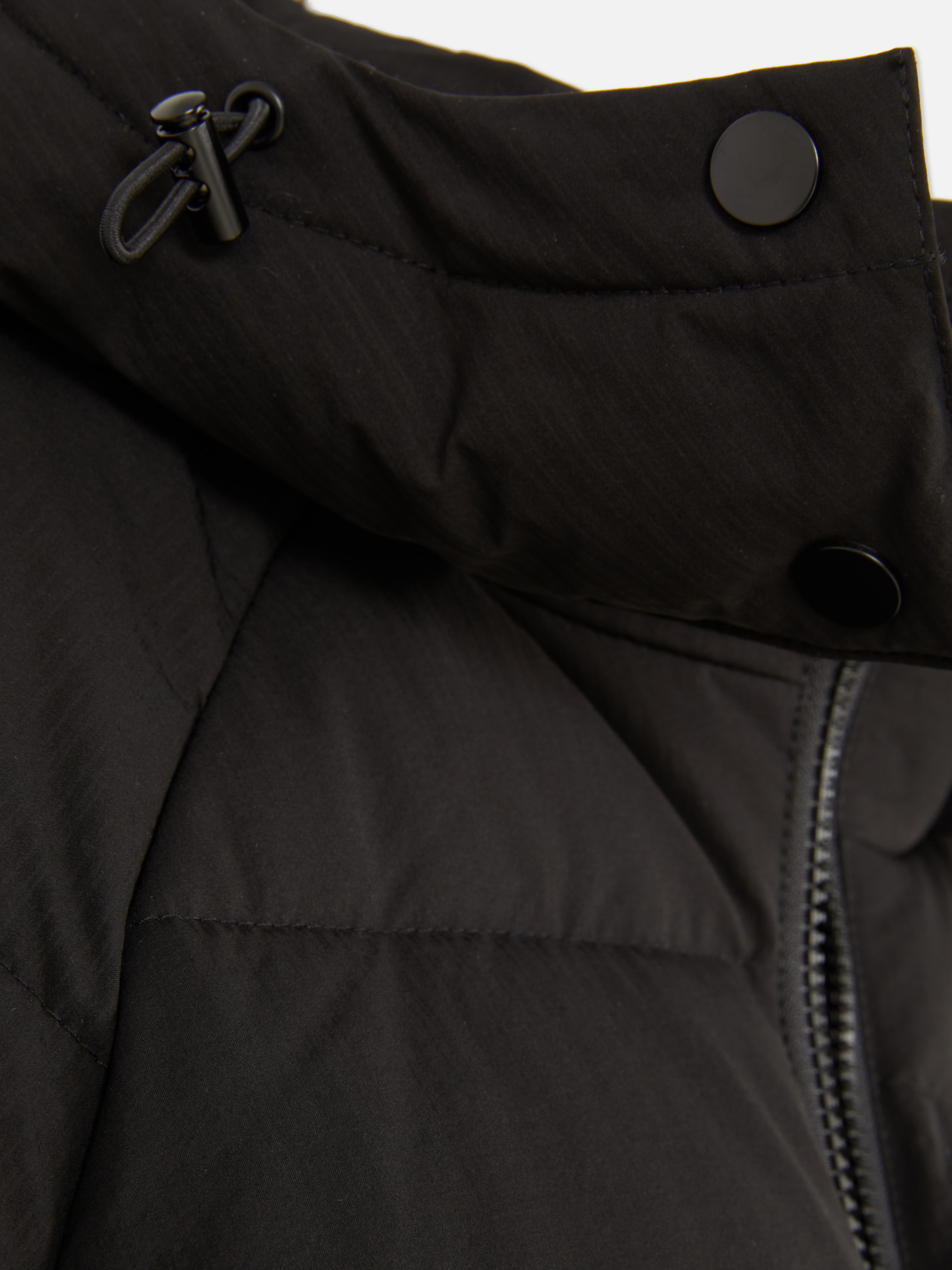 Gewatteerde jas met ingenomen taille