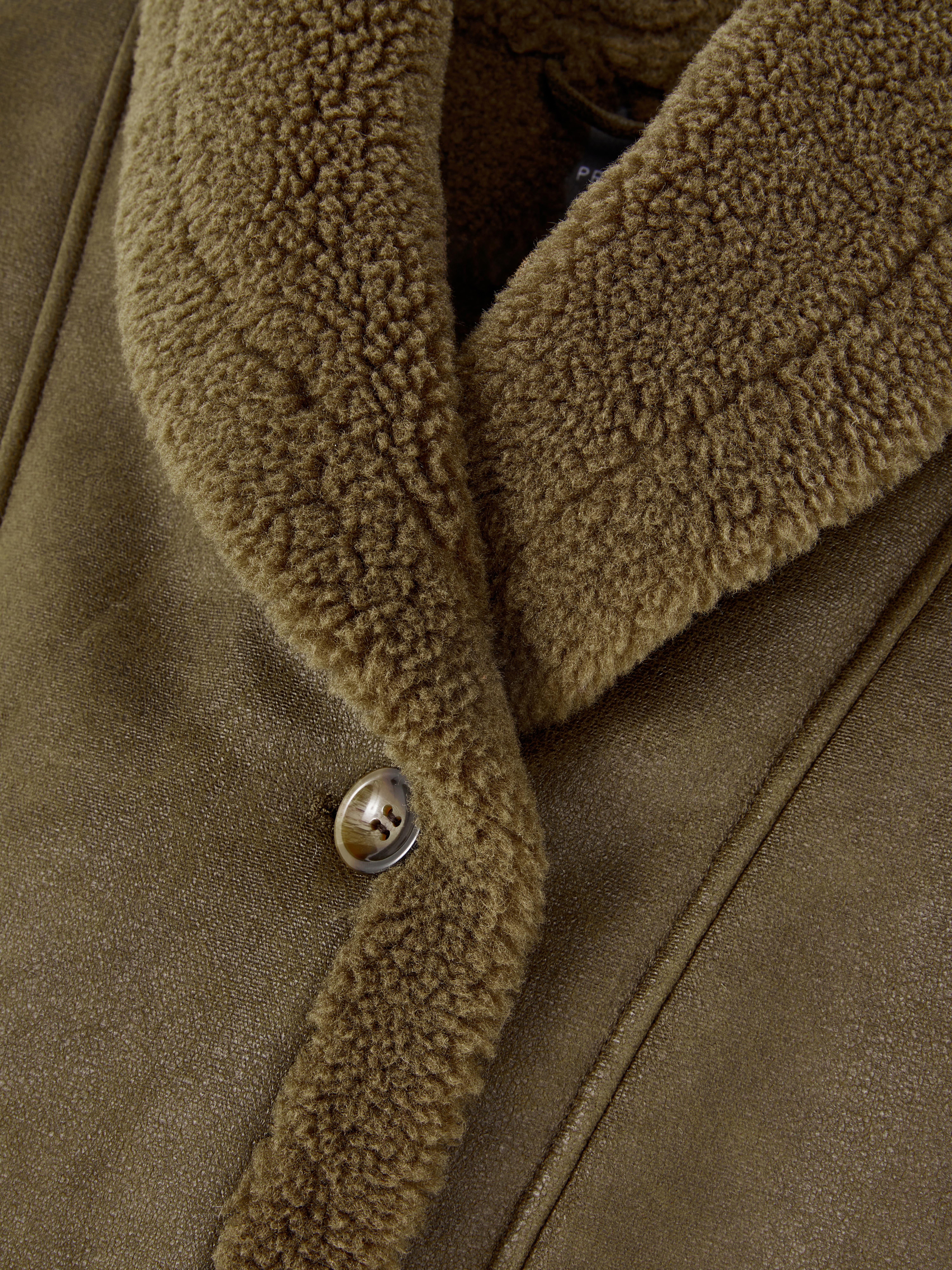 Giacca in PU collo a scialle in montone shearling