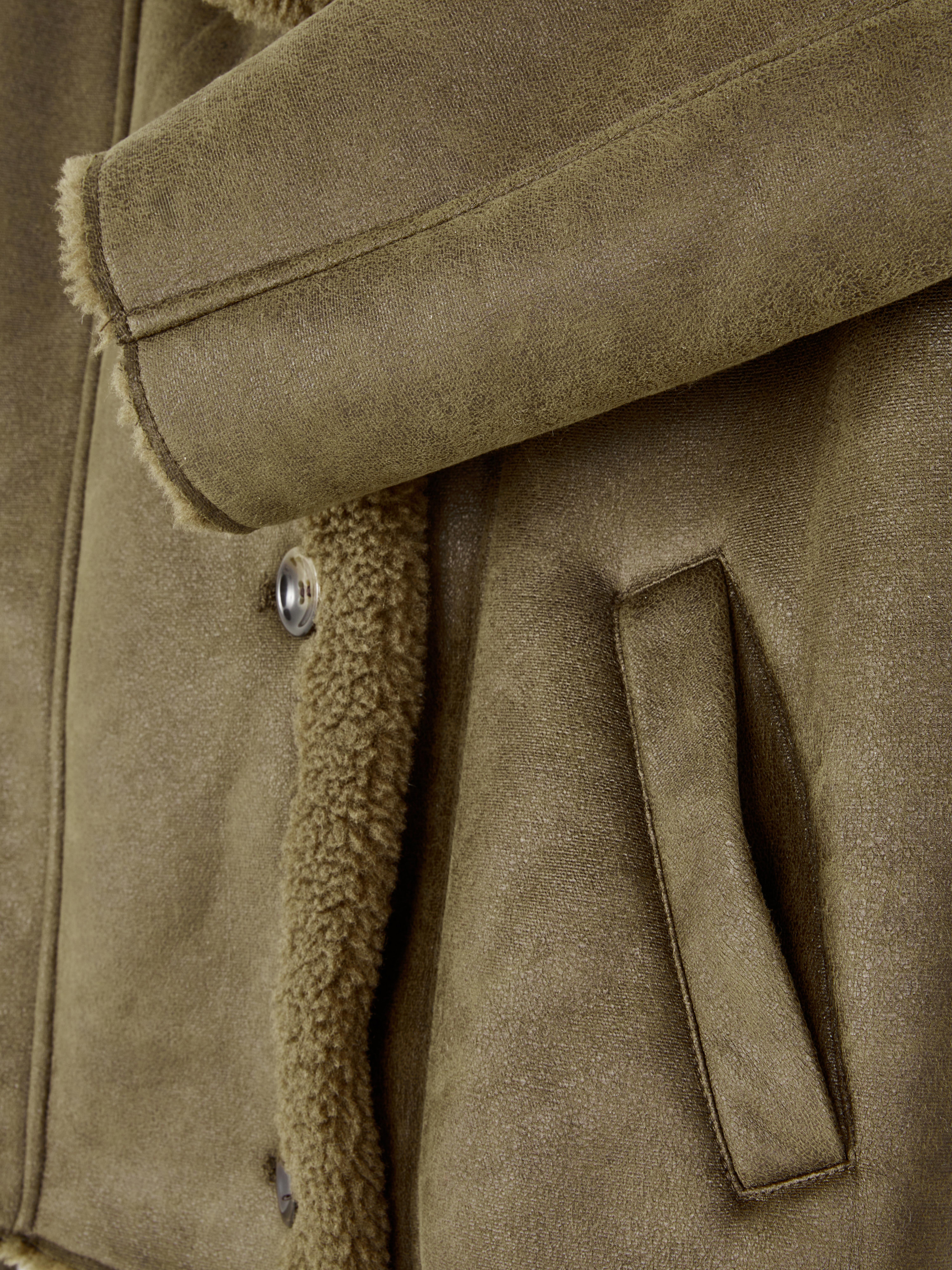 Giacca in PU collo a scialle in montone shearling