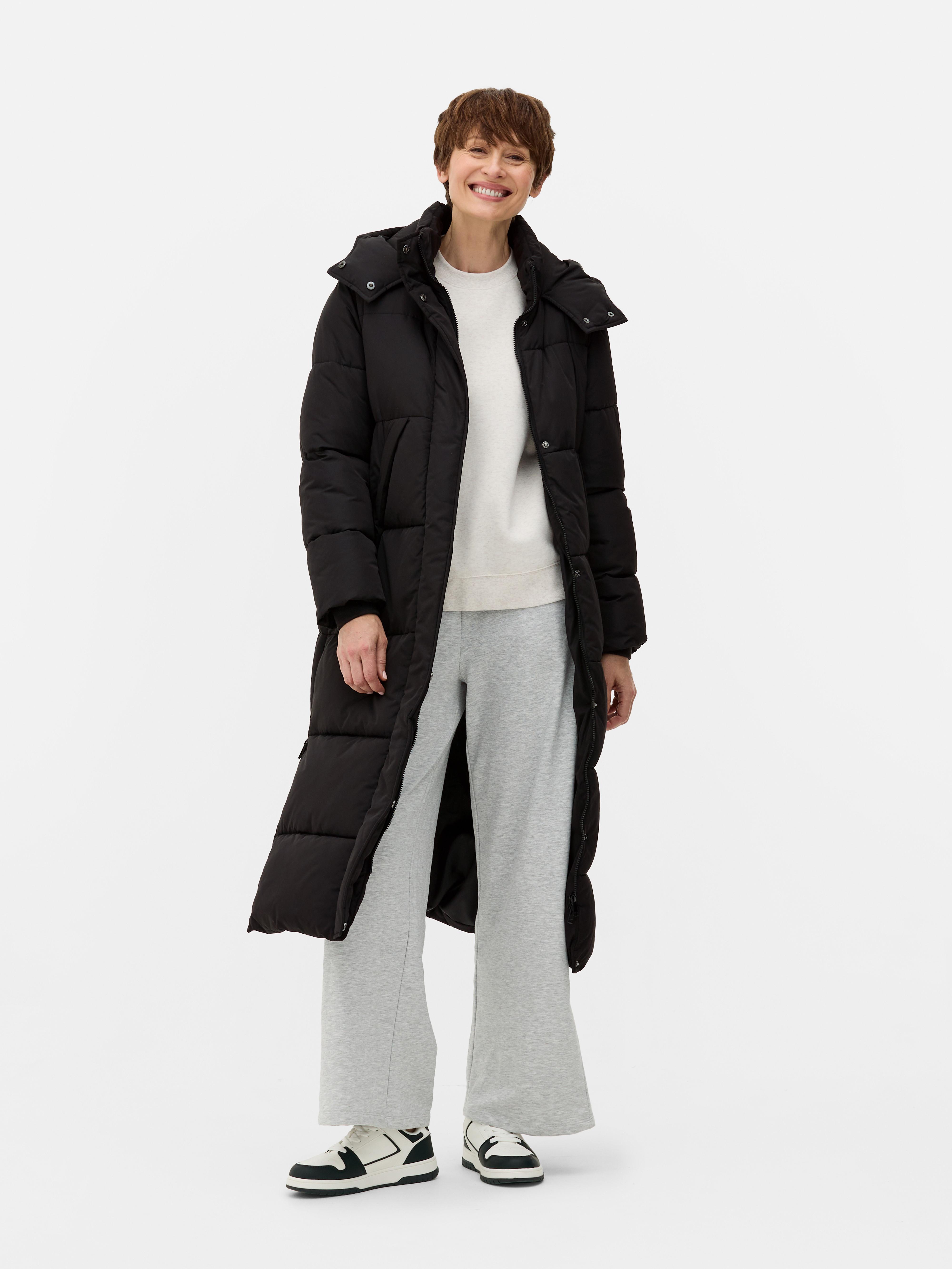 Langer Steppmantel mit schrägen Taschen