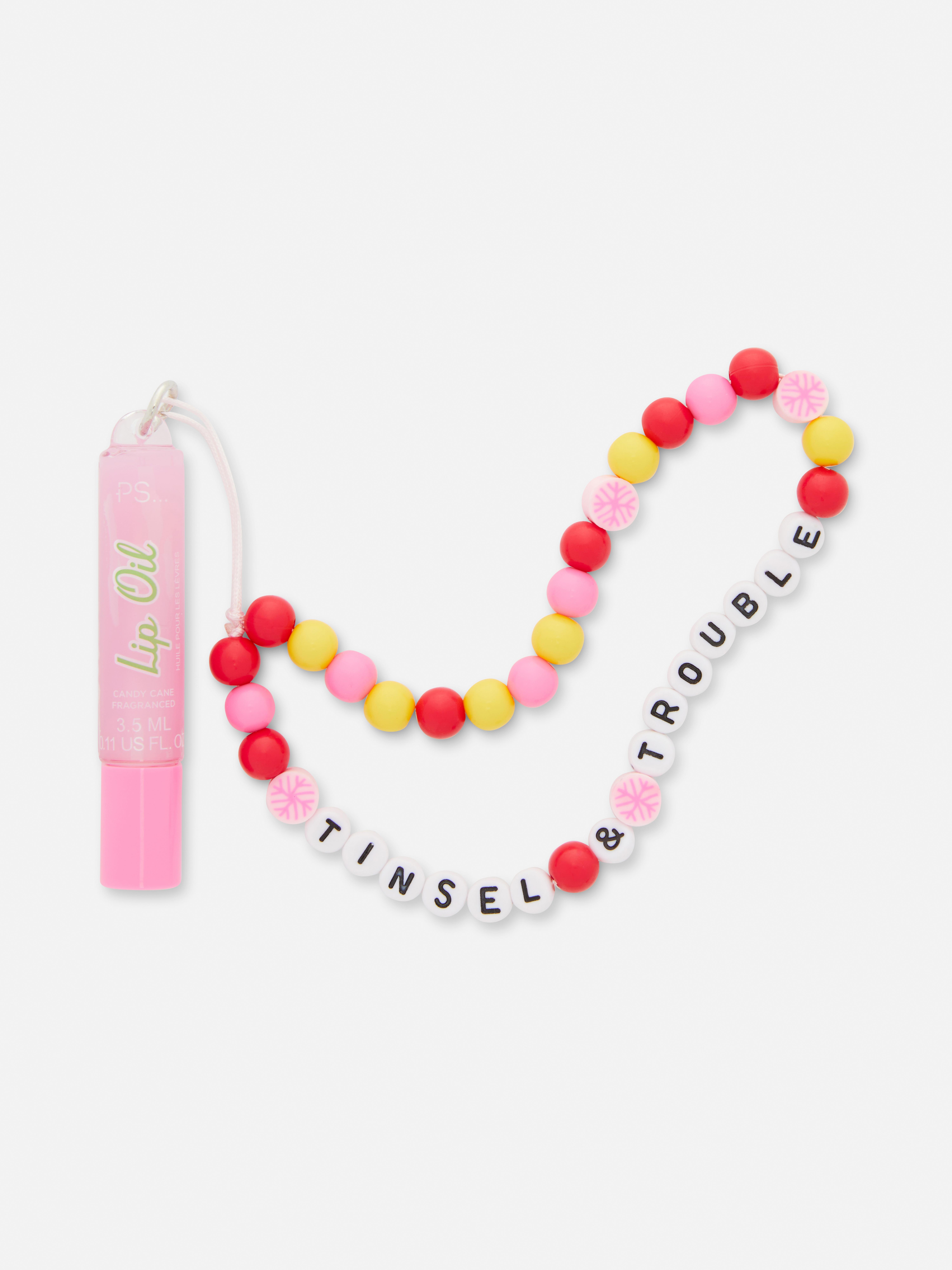 PS... Lippenöl an perlenbesetztem Schlüsselanhänger