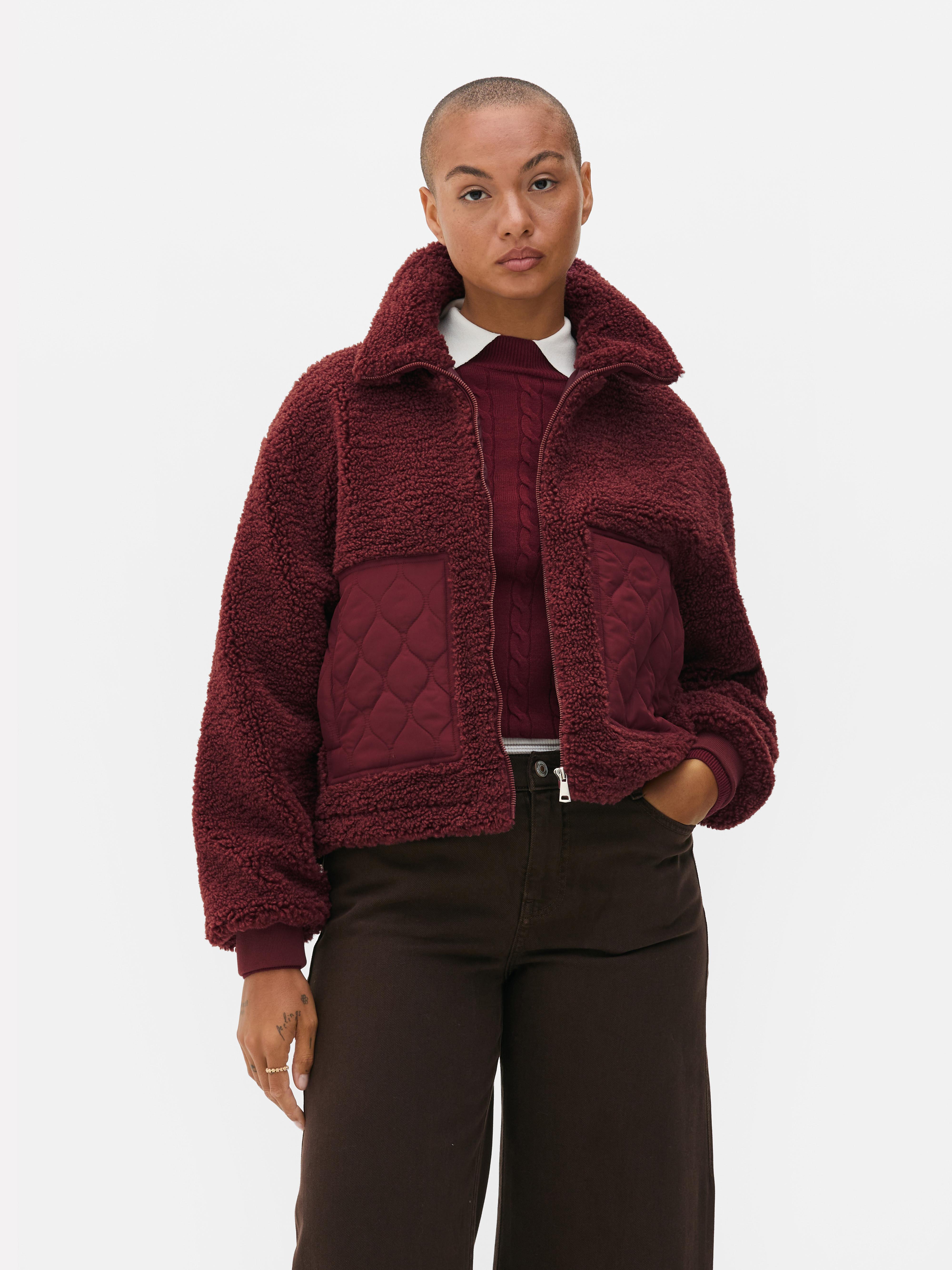 Casaco malha polar bolso contrastante