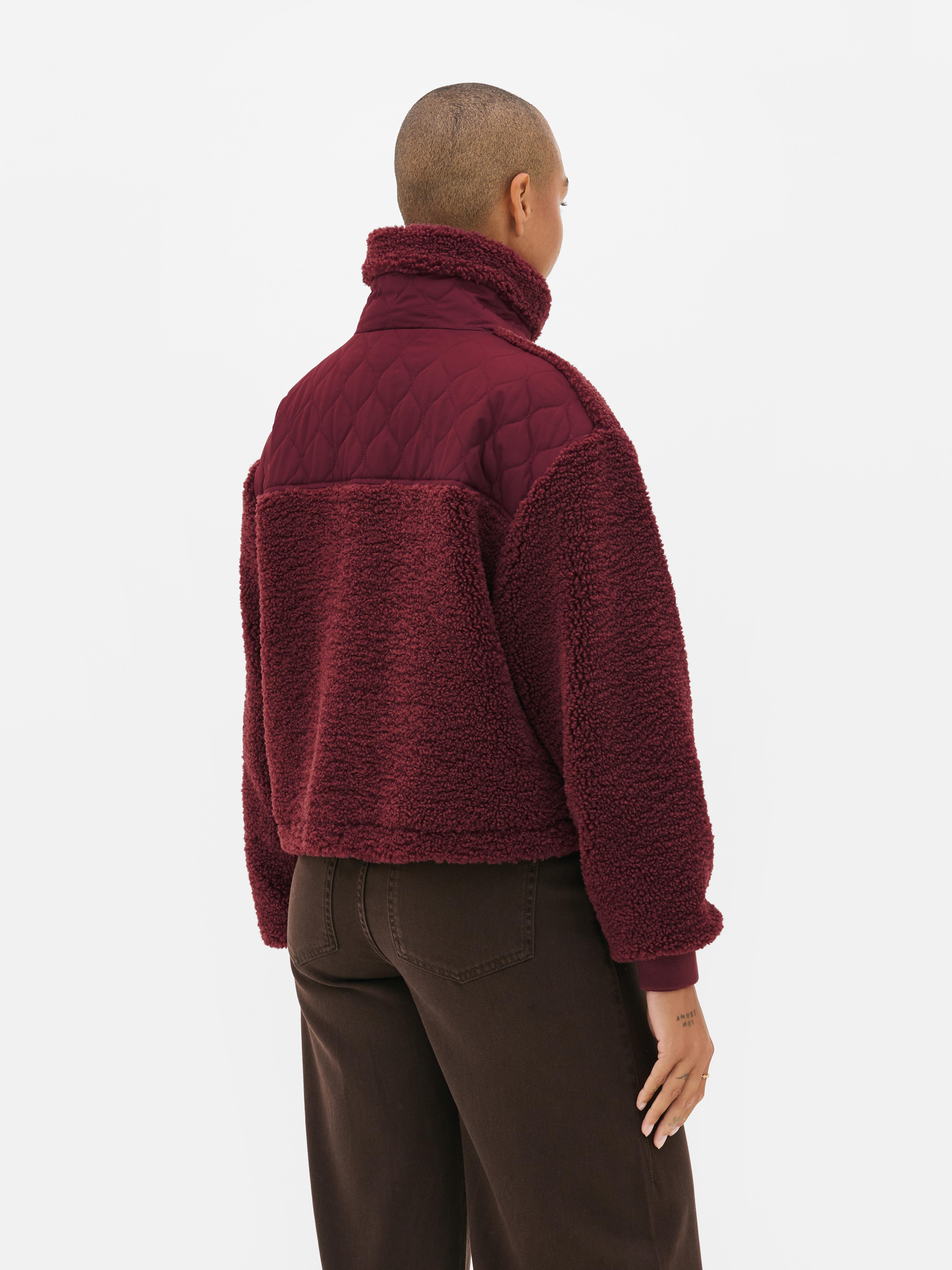 Casaco malha polar bolso contrastante