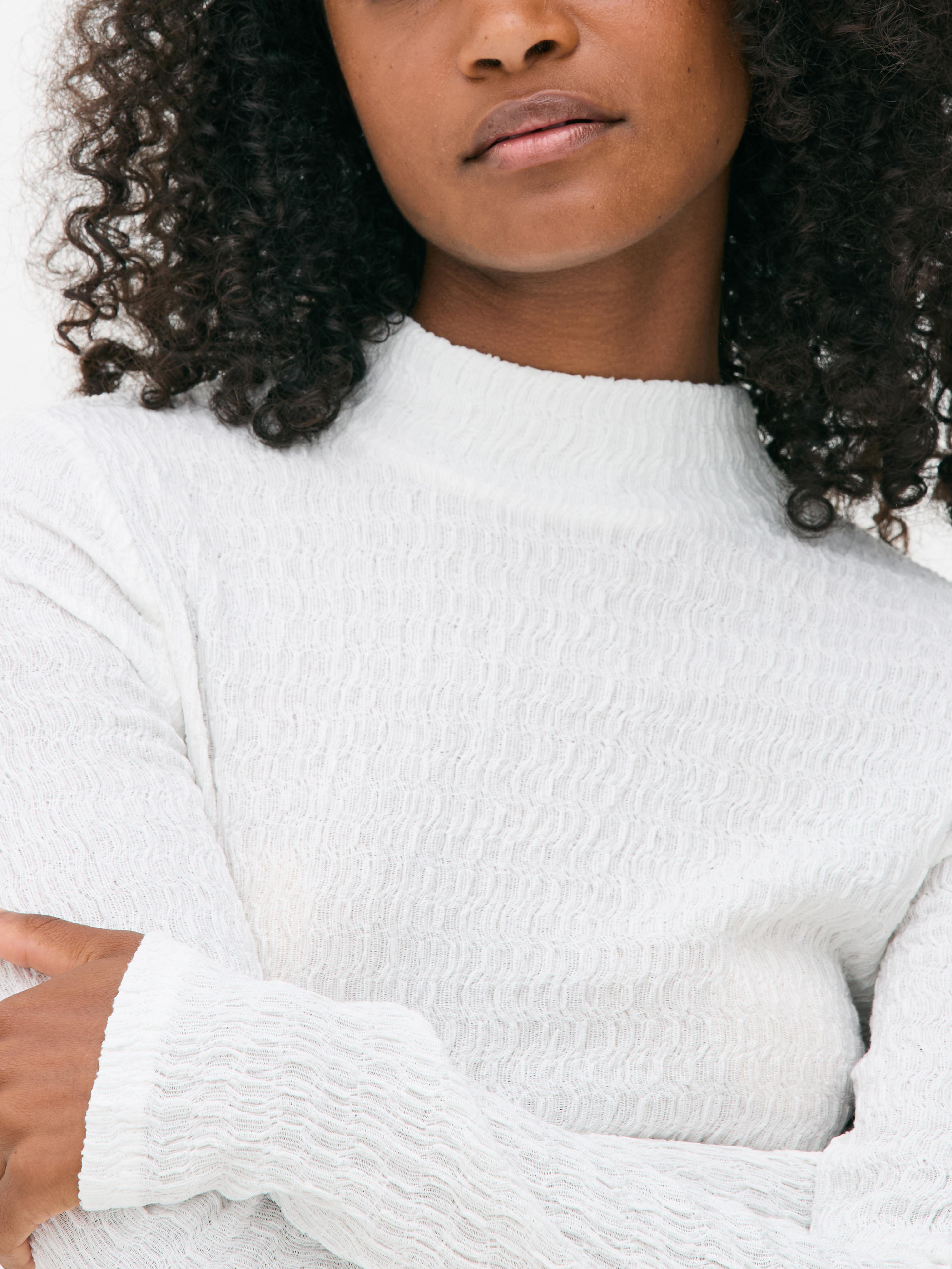 Top met hoge hals en textuur