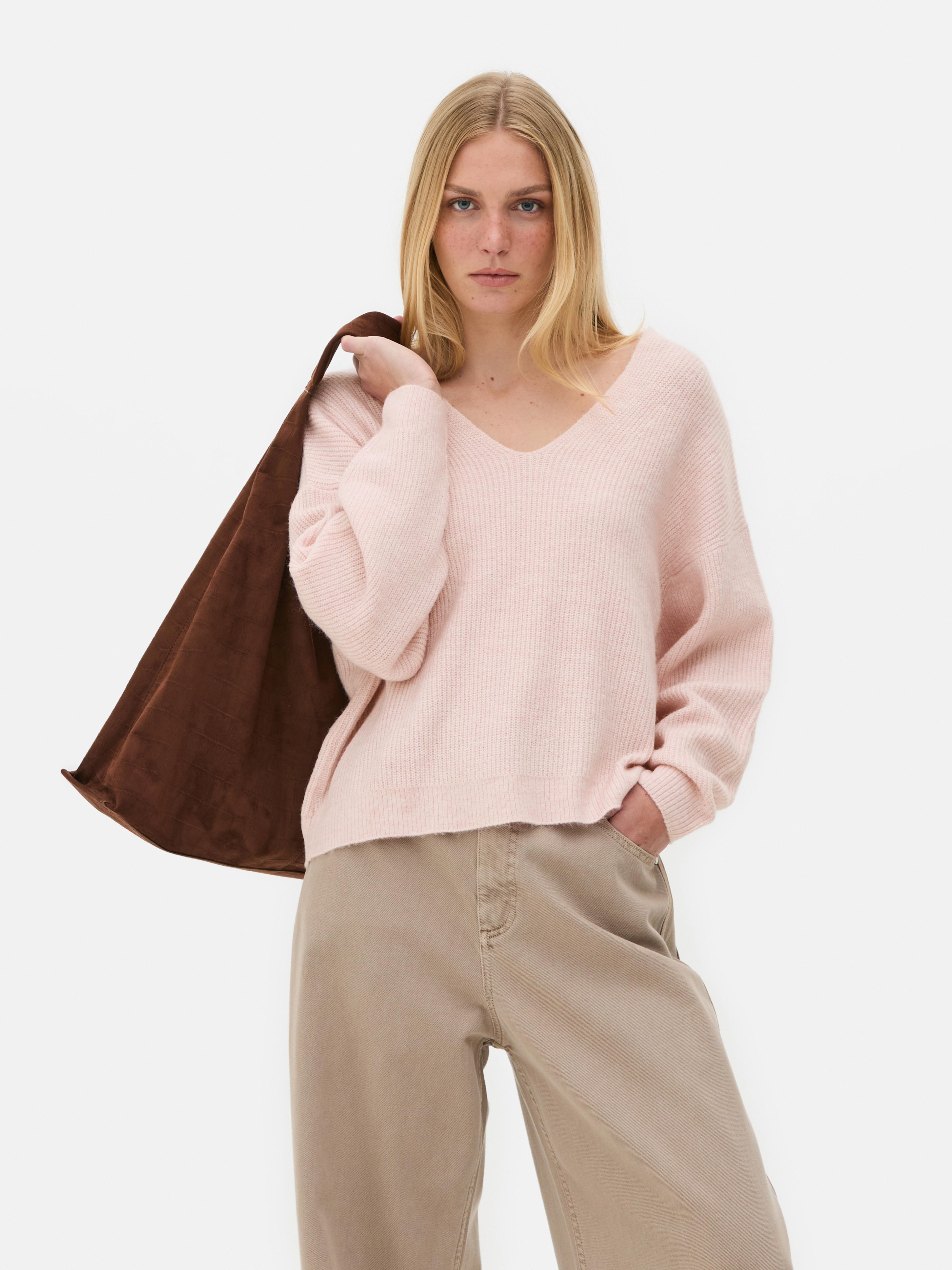 Camisola ombros descaídos decote em V