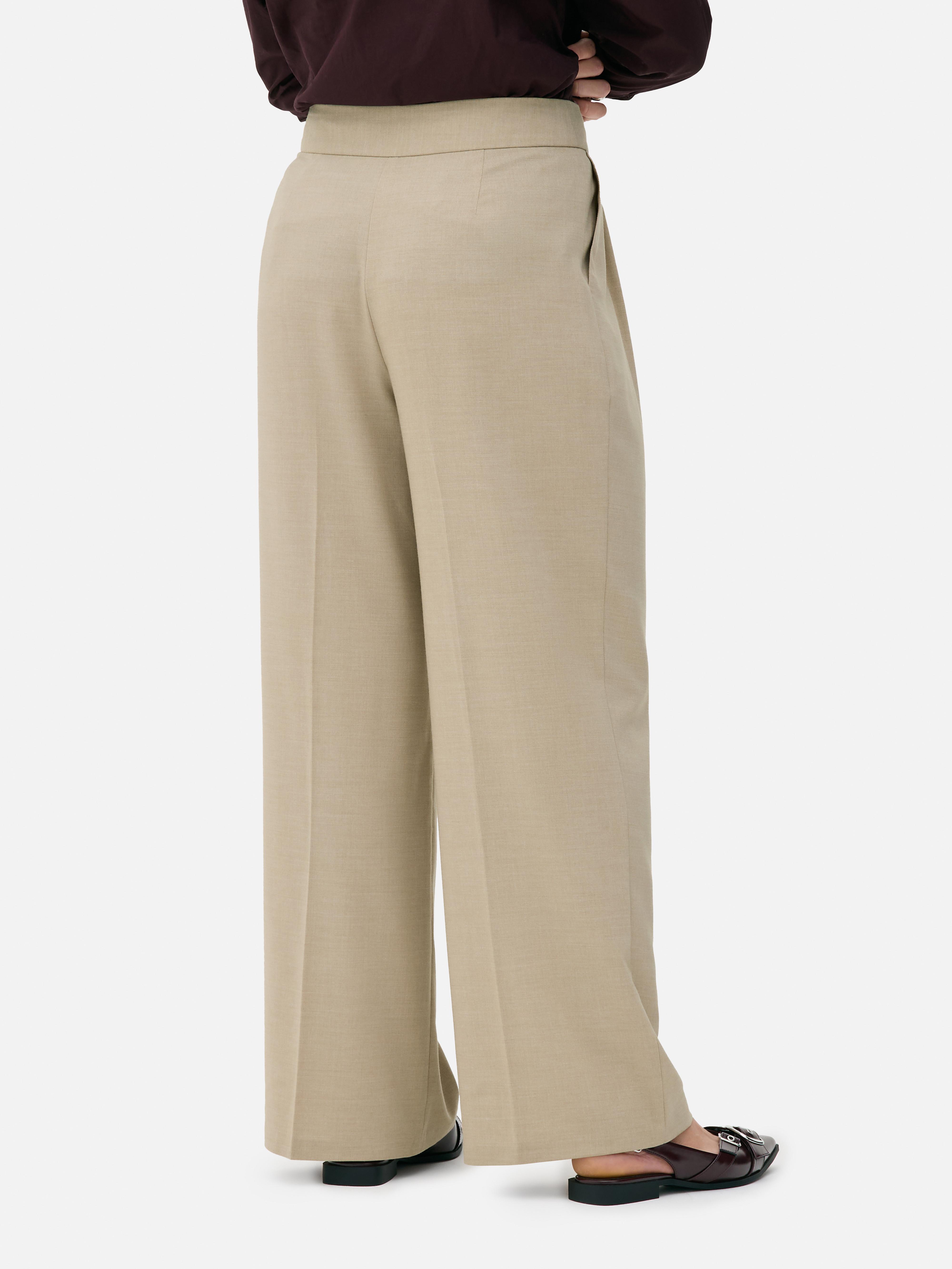 Pantalones plisados de talle medio