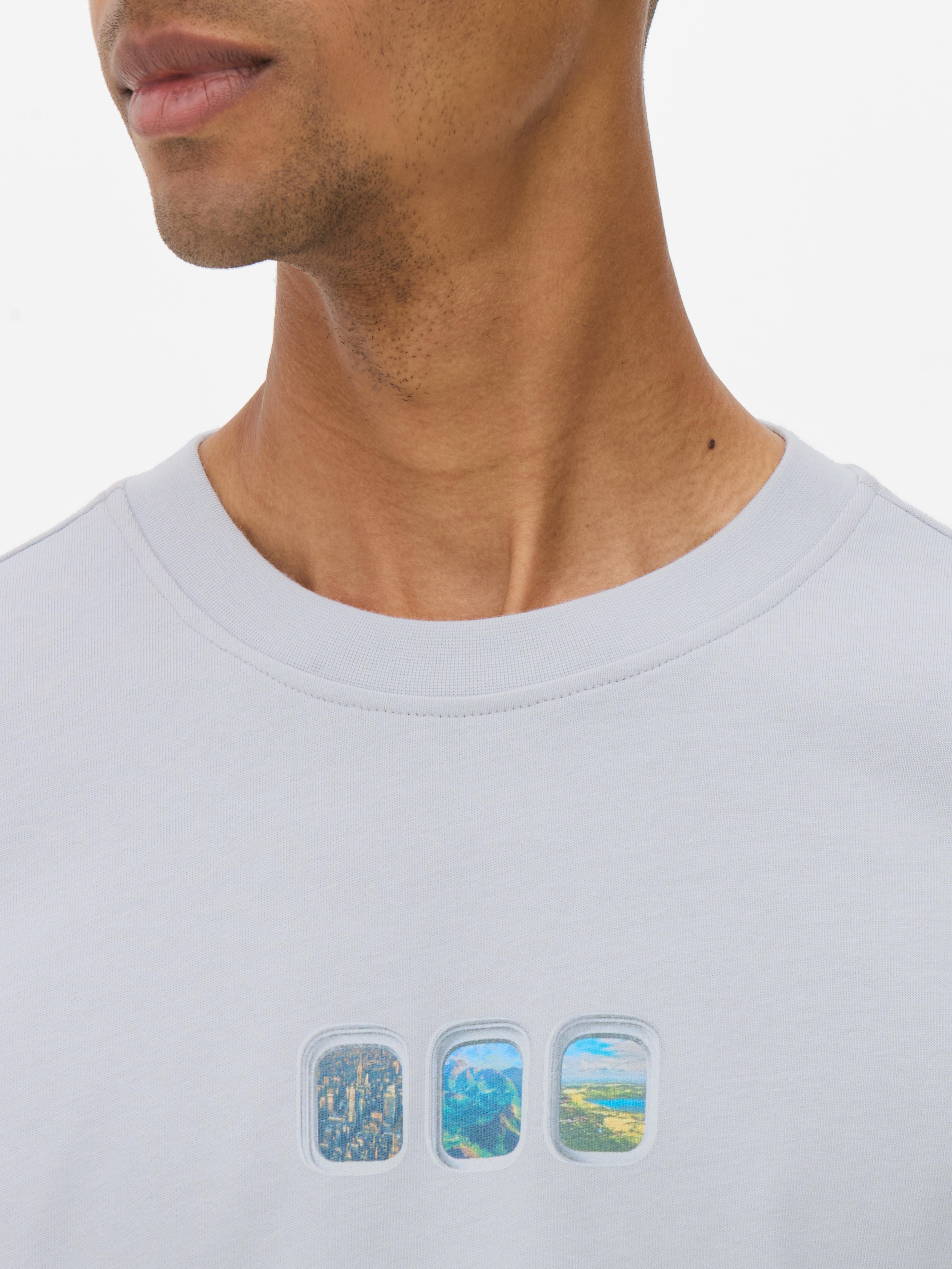T-shirt met vliegtuigvensterprint