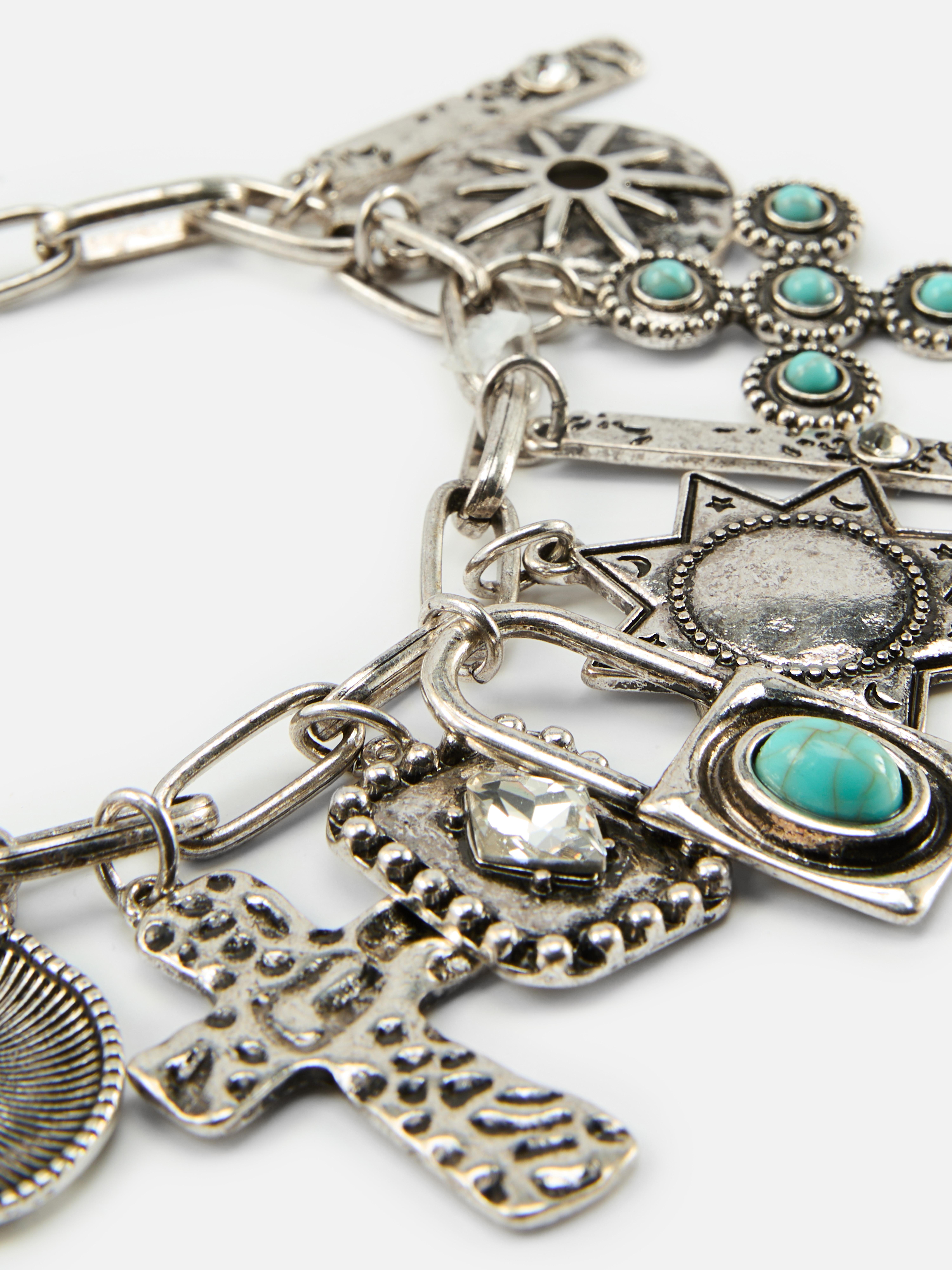 Pulsera gruesa con colgantes de Rita Ora
