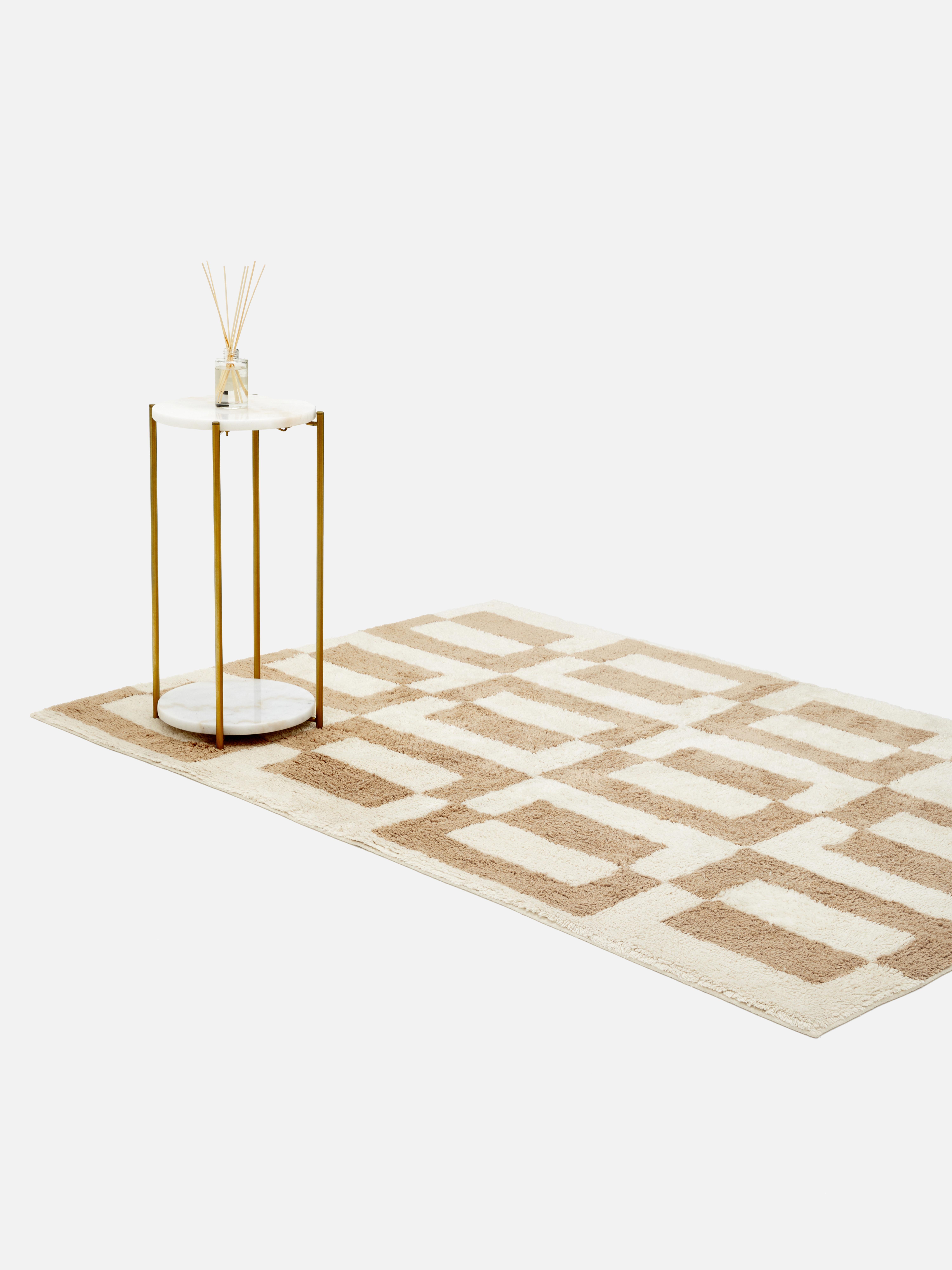 Groot geometrisch vloerkleed