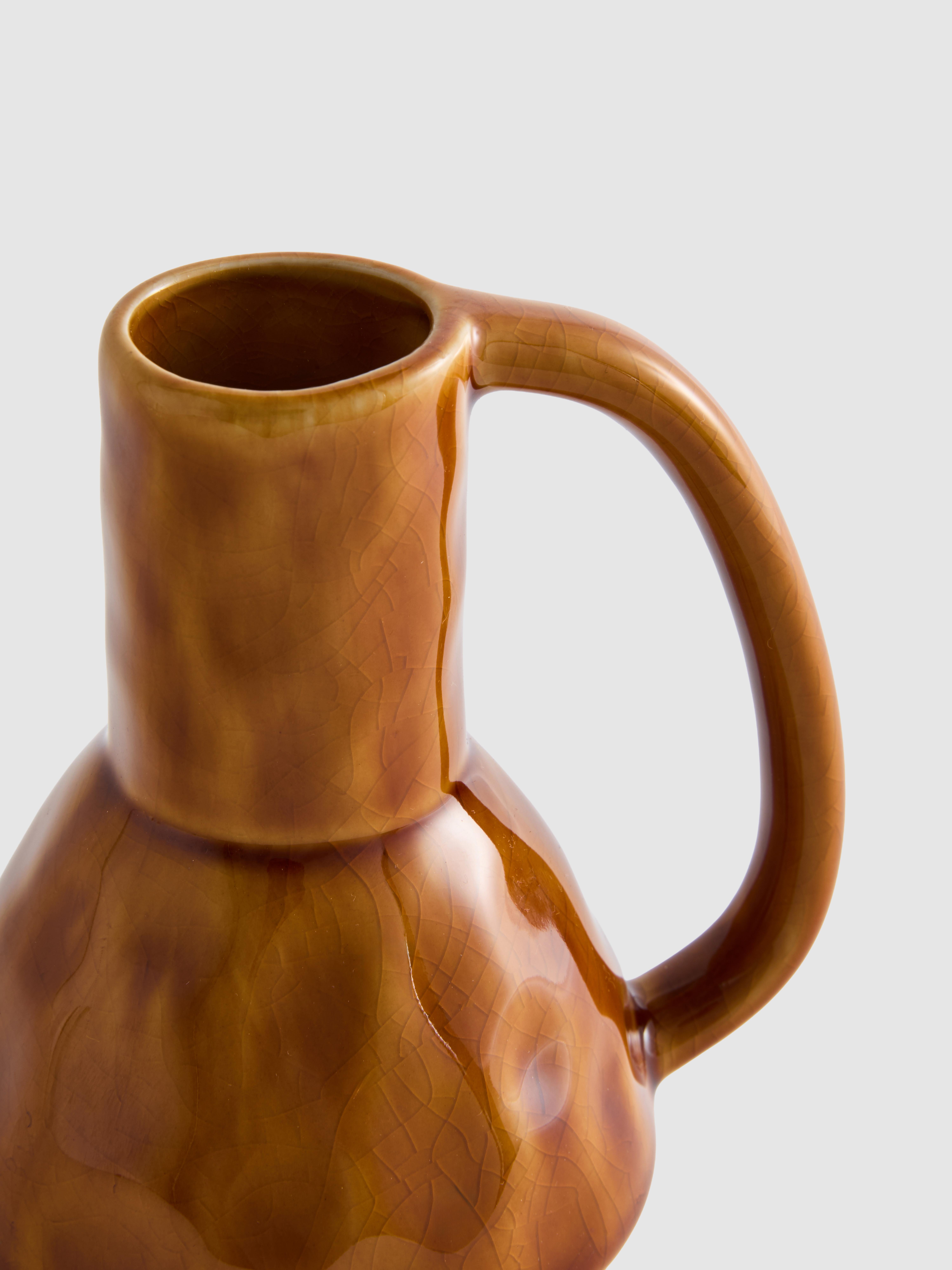 Kleine keramieken decoratiekan