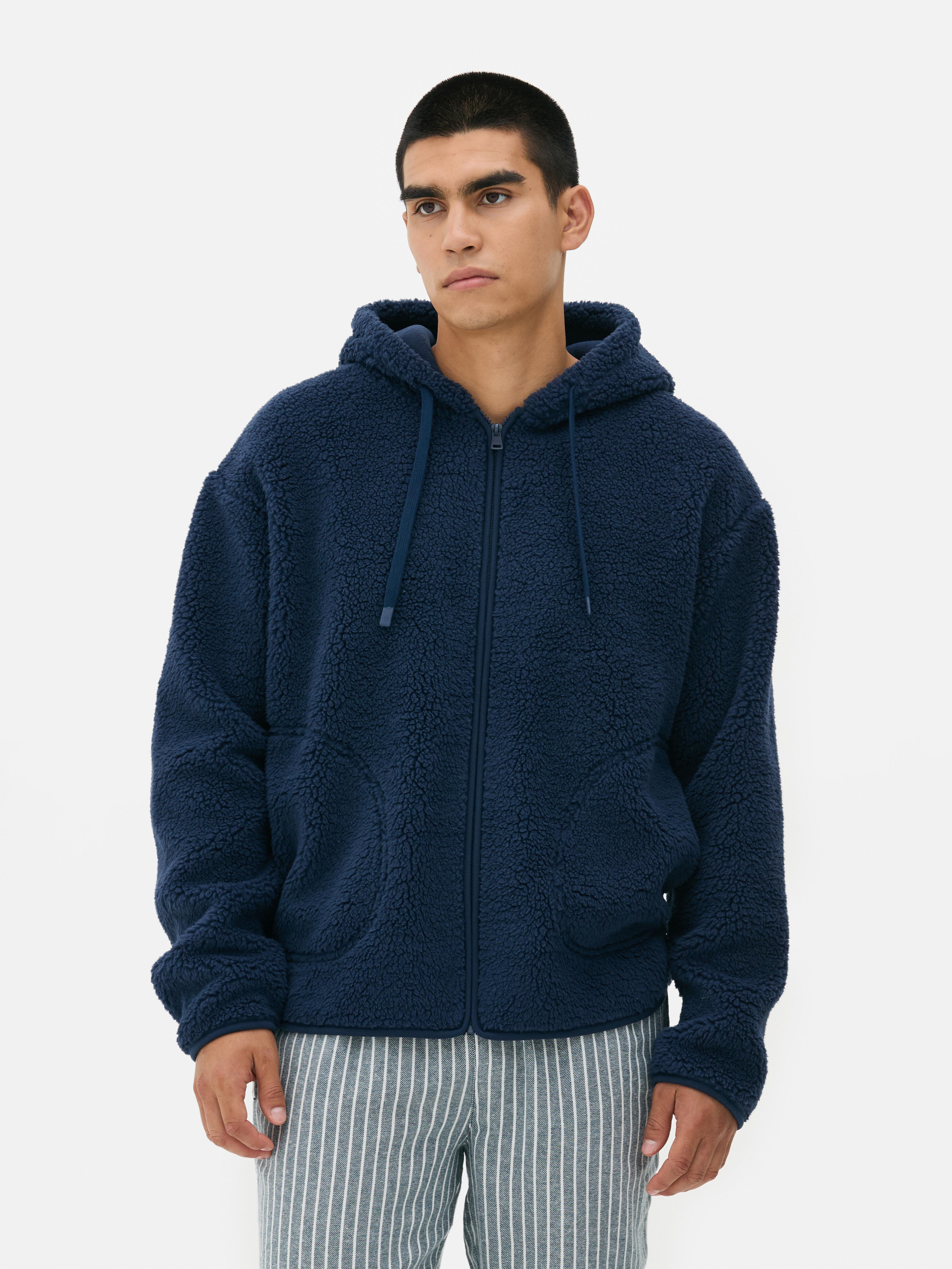 Sweat à capuche zippé effet mouton retourné