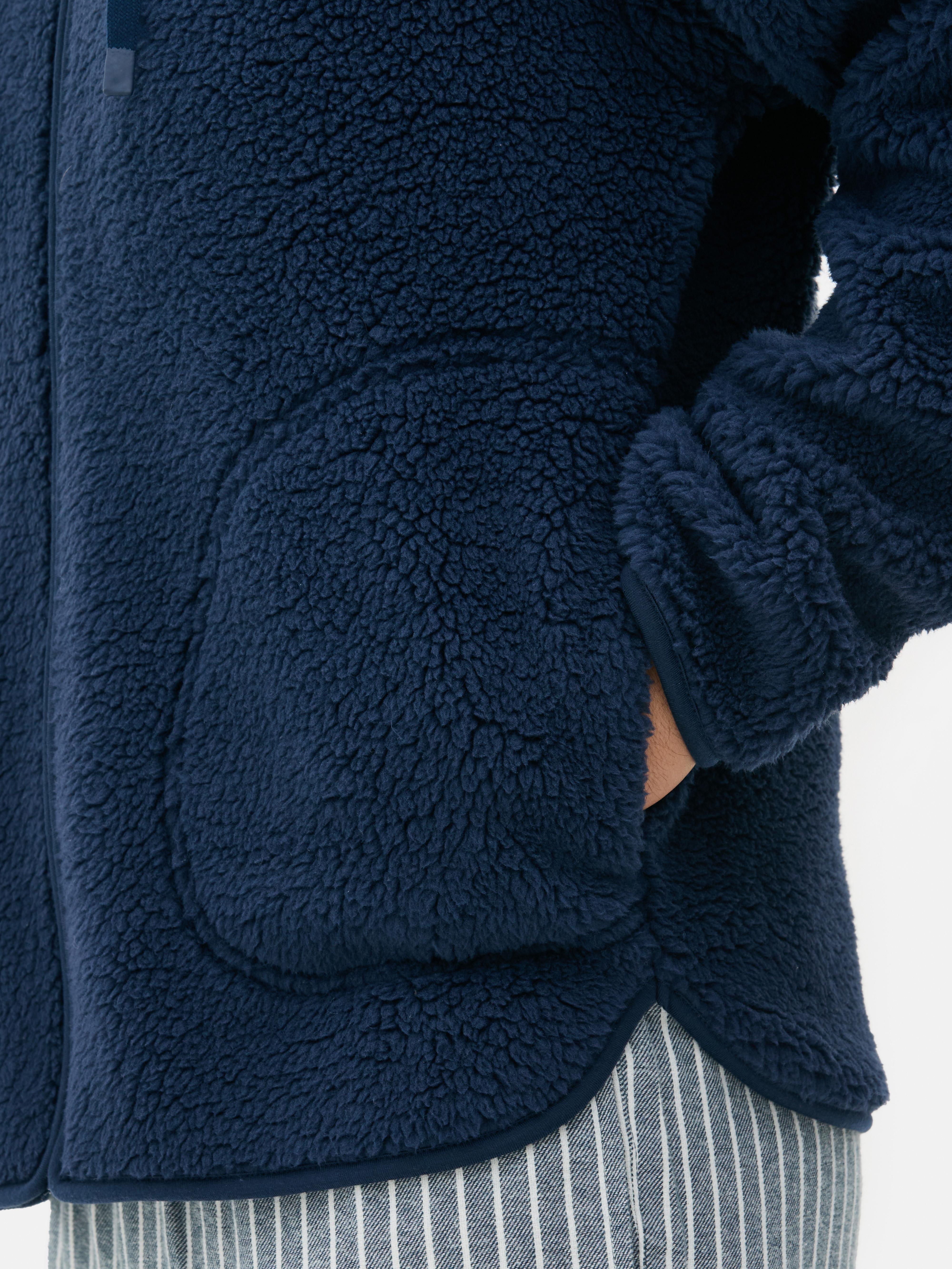 Sweat à capuche zippé effet mouton retourné