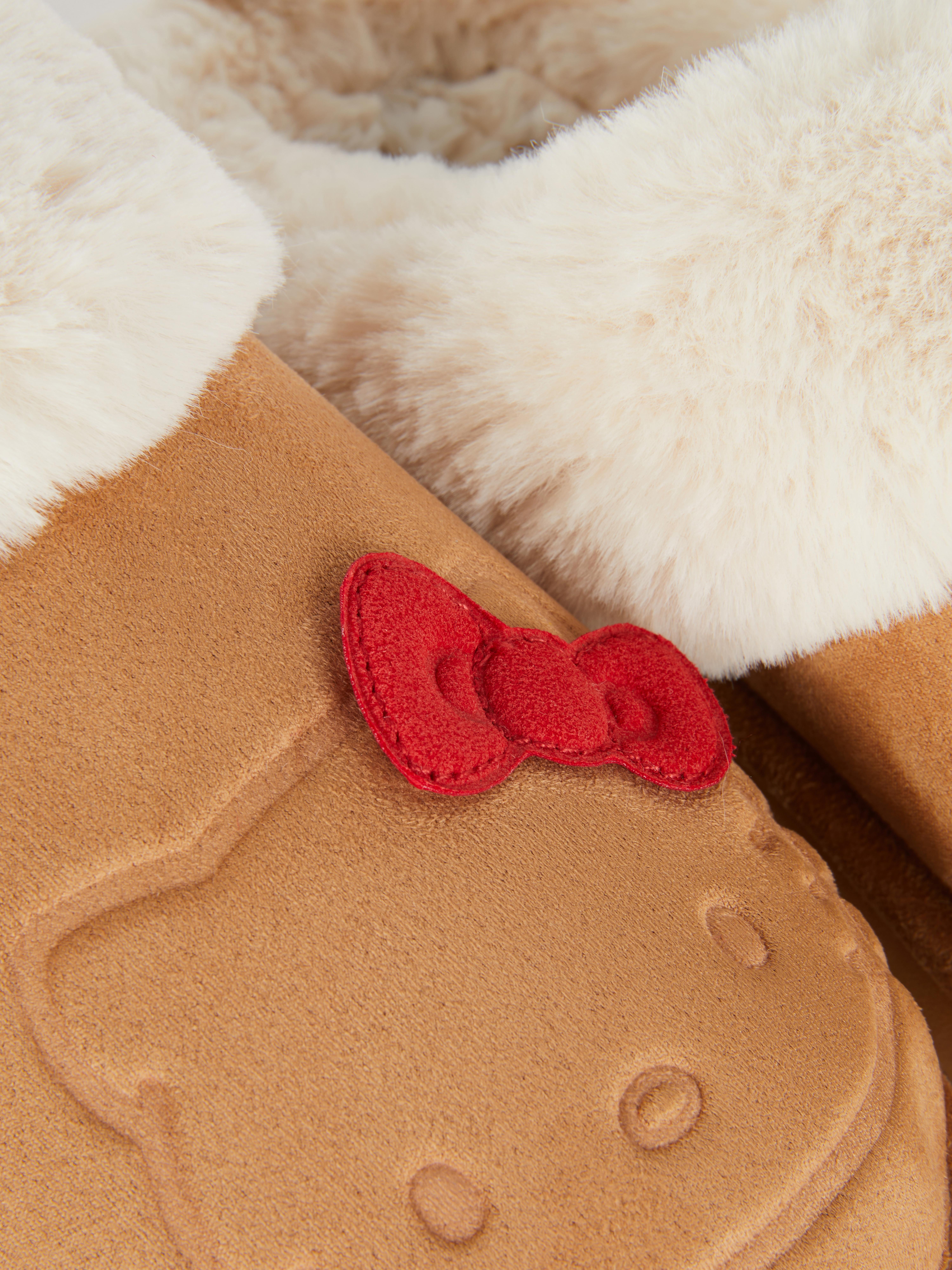 Pantuflas cálidas tipo zueco de Hello Kitty