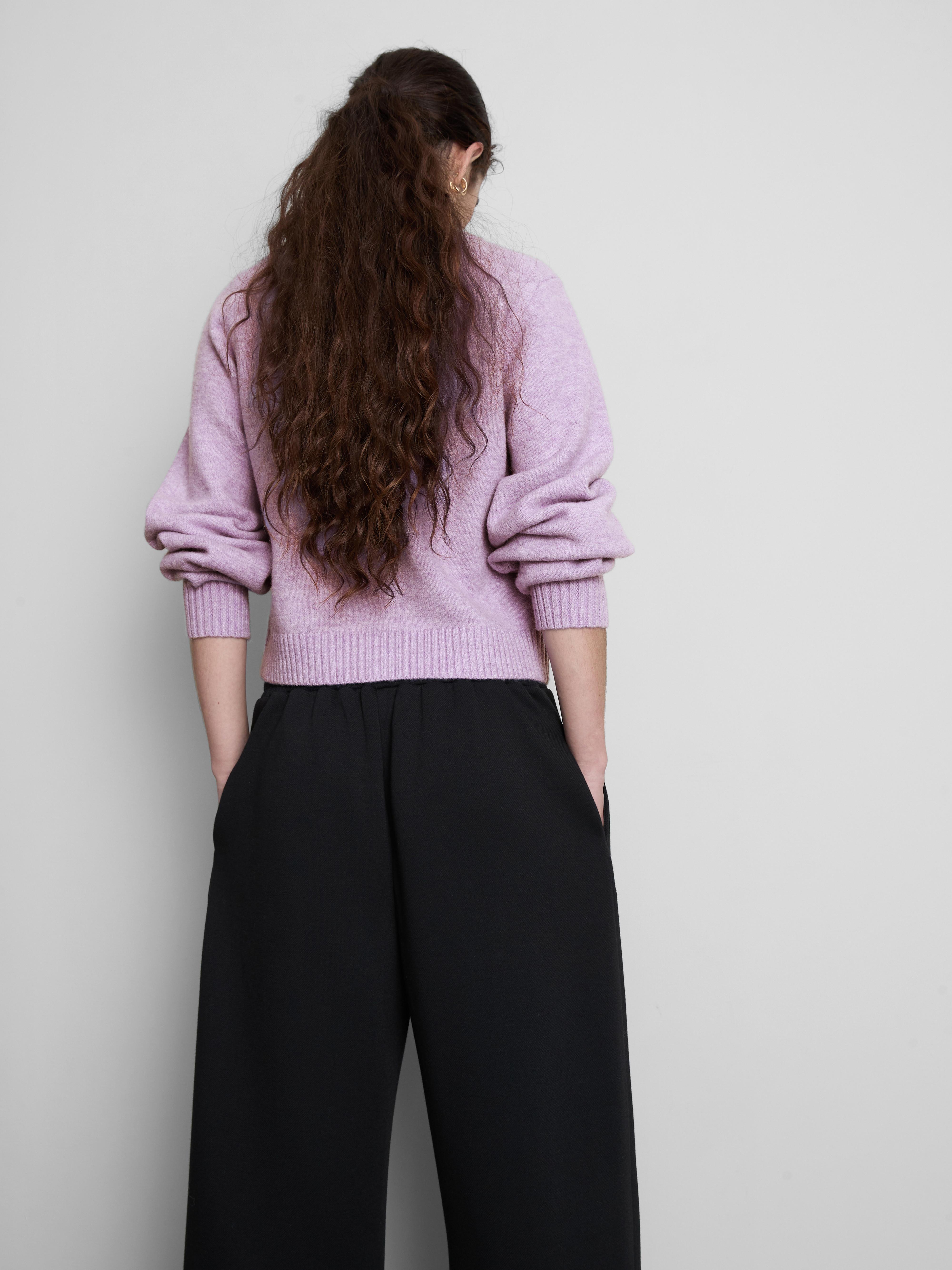 Gilet en maille à nœuds