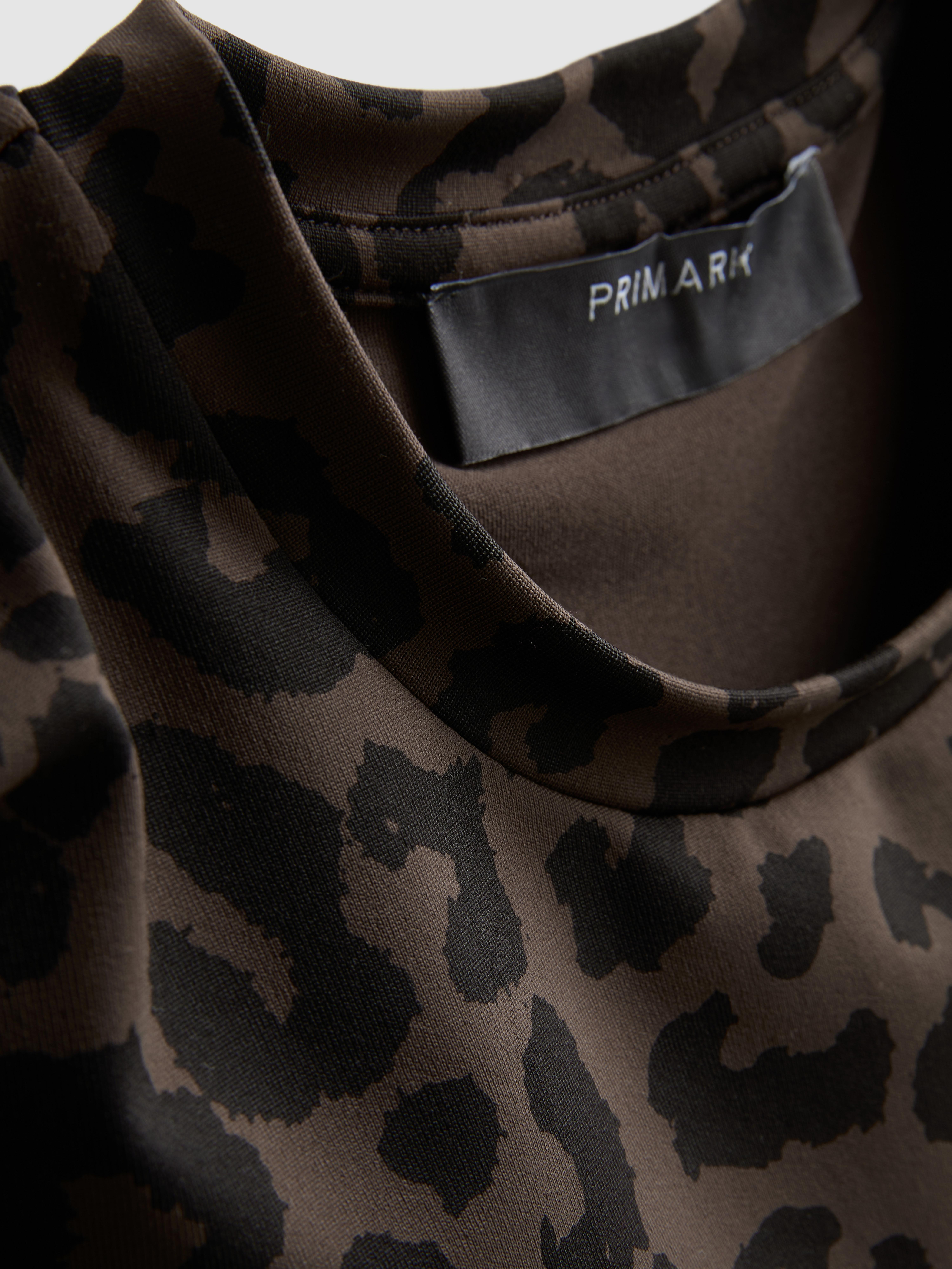 Polyamide top met ronde hals en lange mouwen