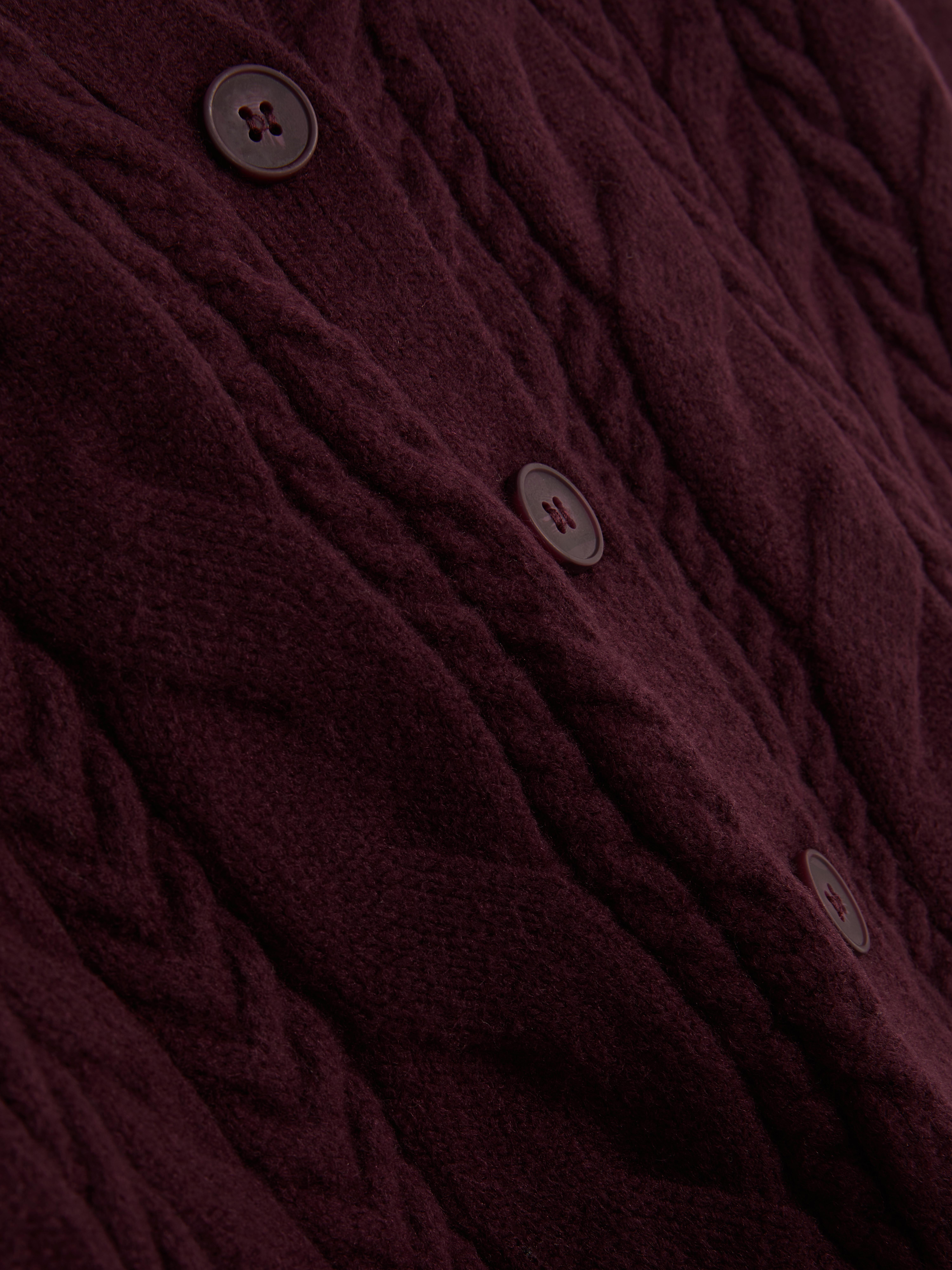 Cardigan in maglia a trecce spessa