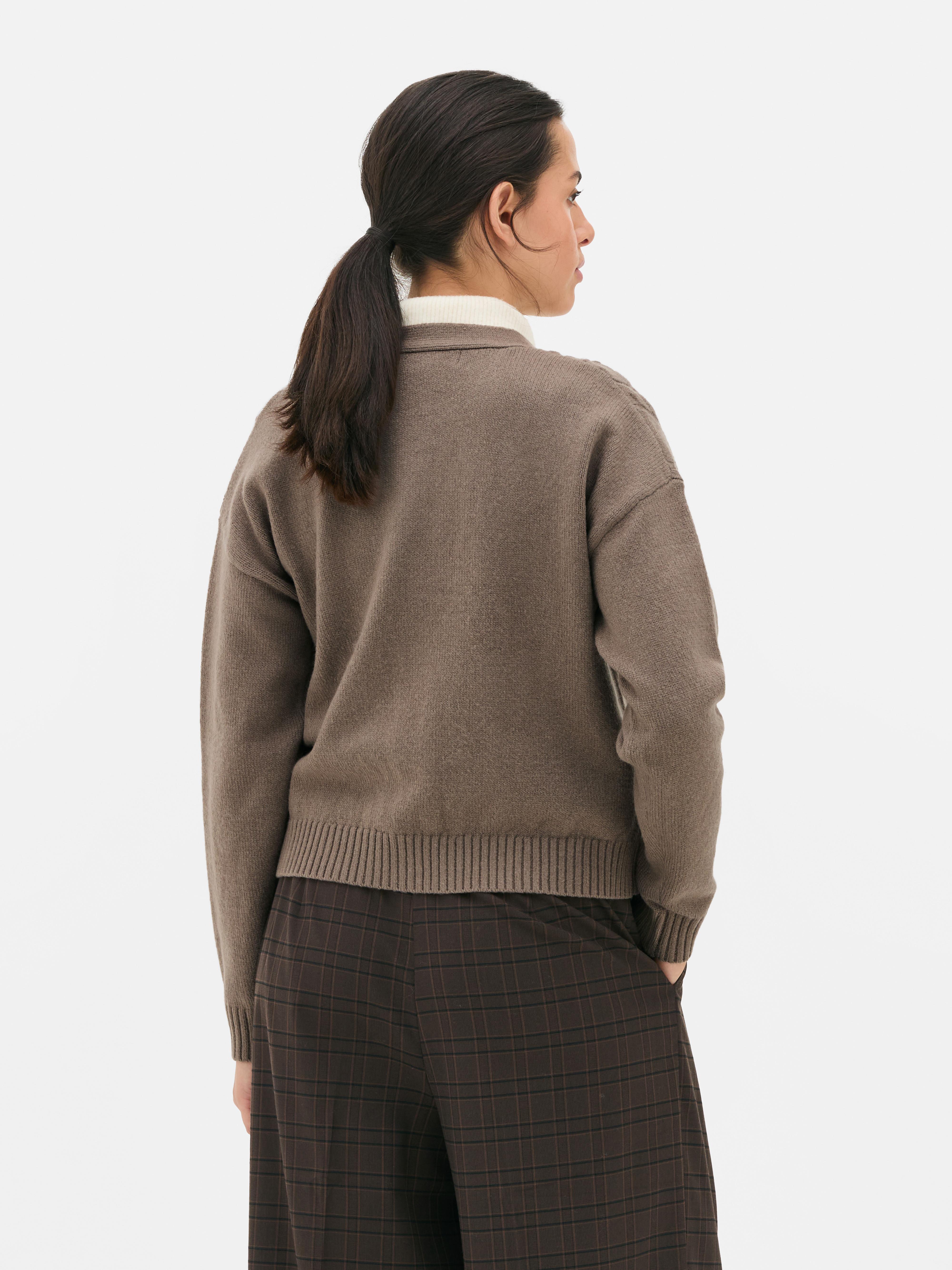 Cardigan in maglia a trecce spessa