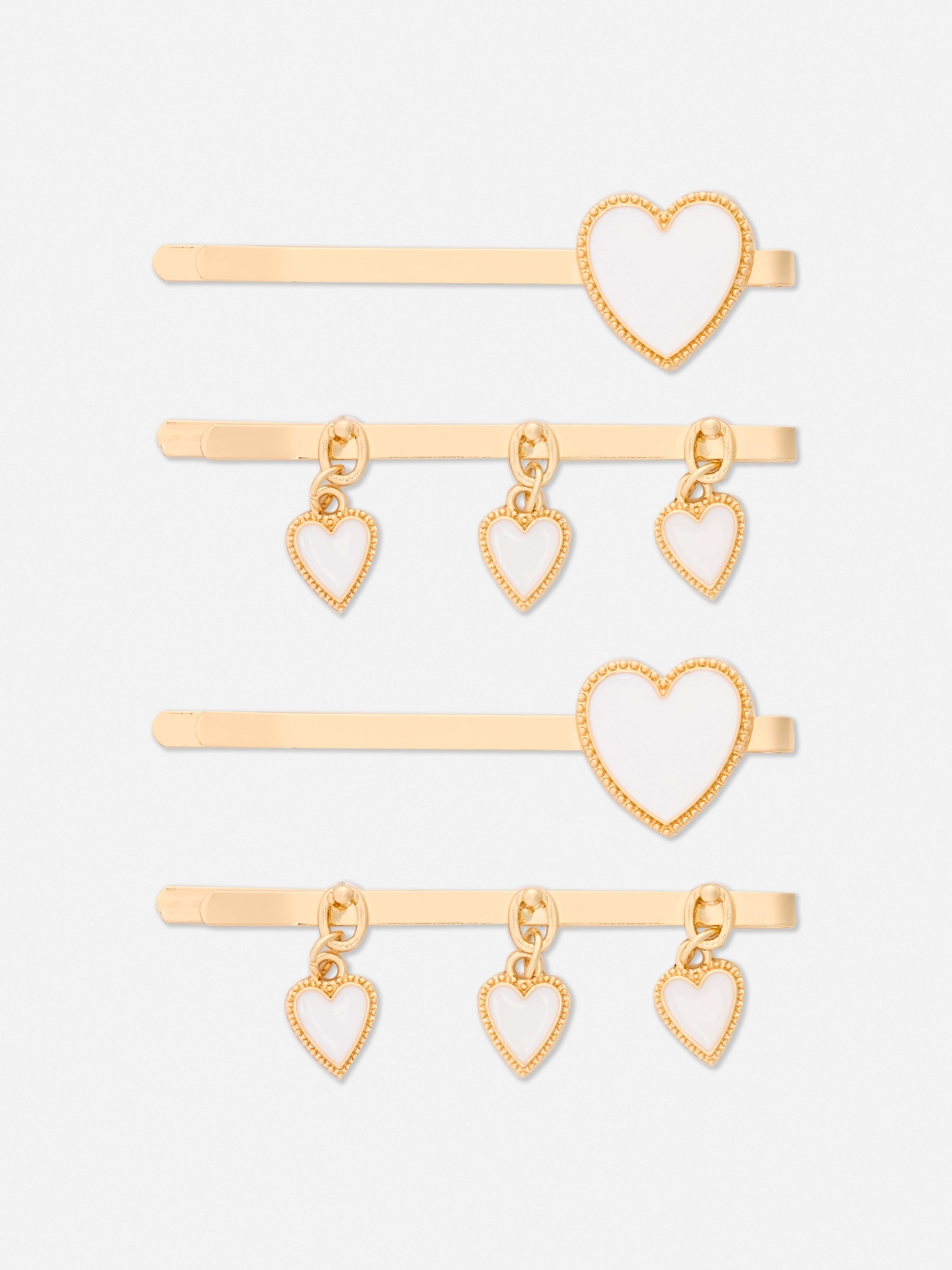 Lot de 4 barrettes à breloques cœurs