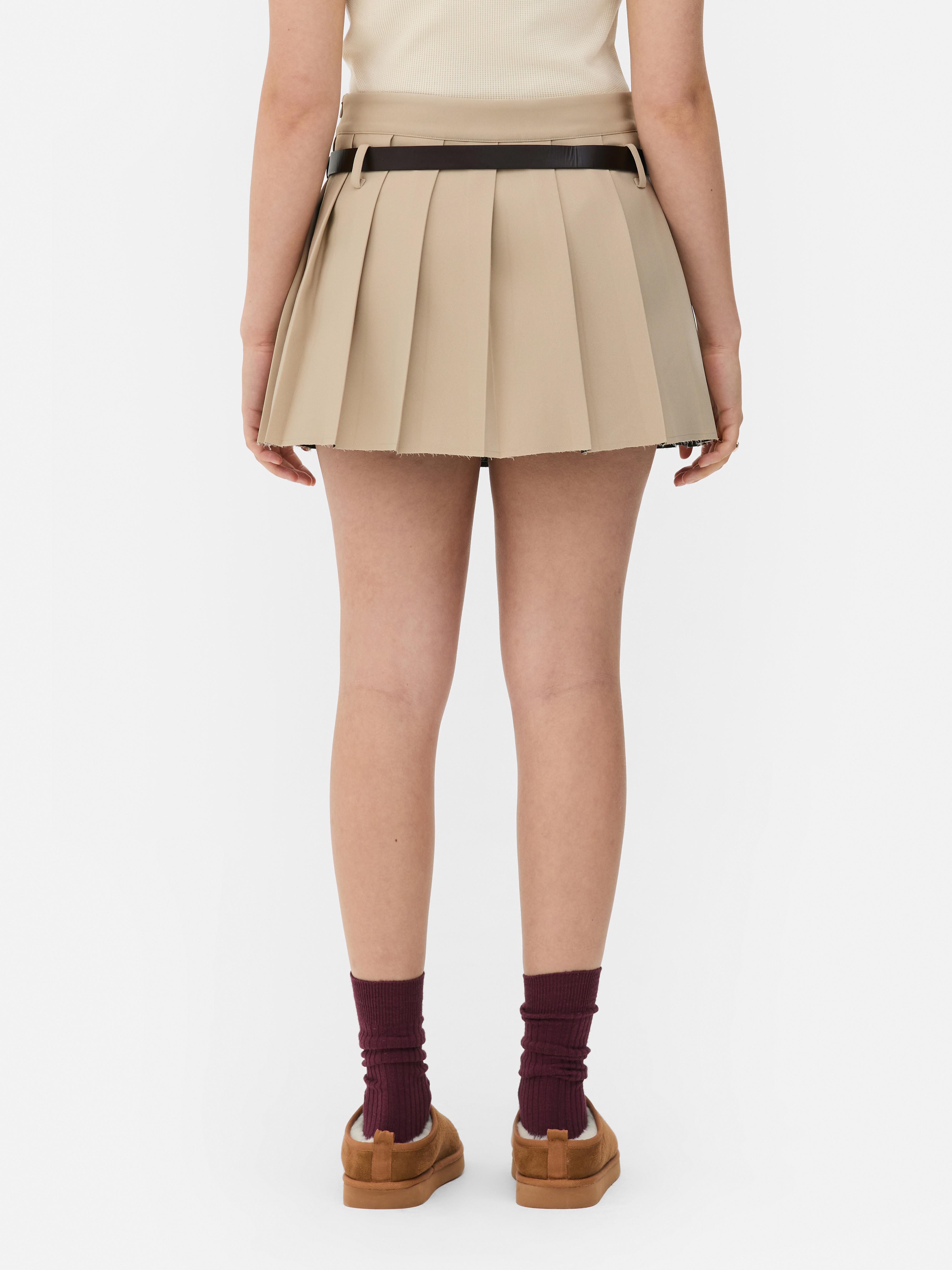 Geplooide minirok met riem