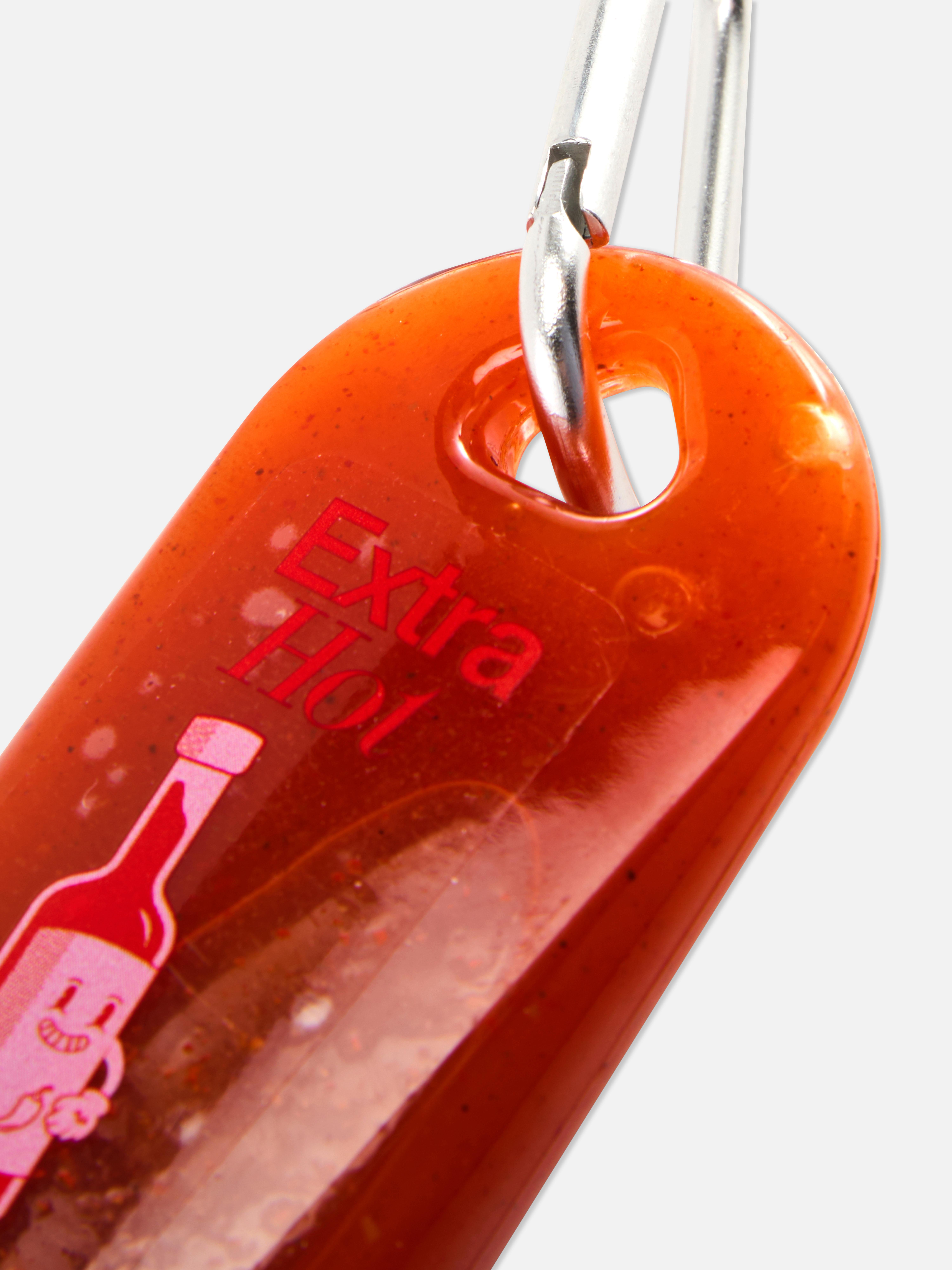 Llavero en forma de salsa picante