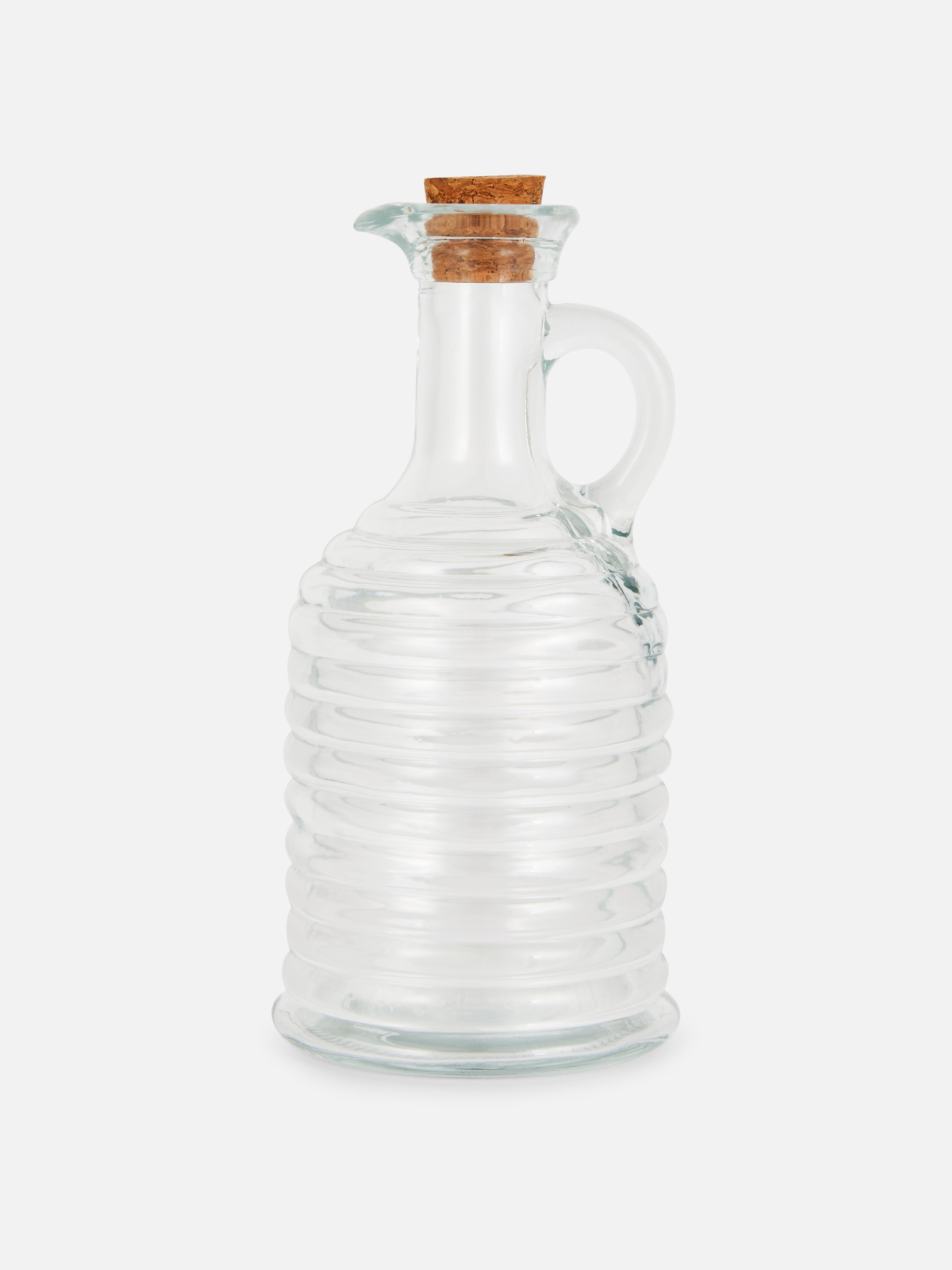 Glazen olieflesje met ribbels