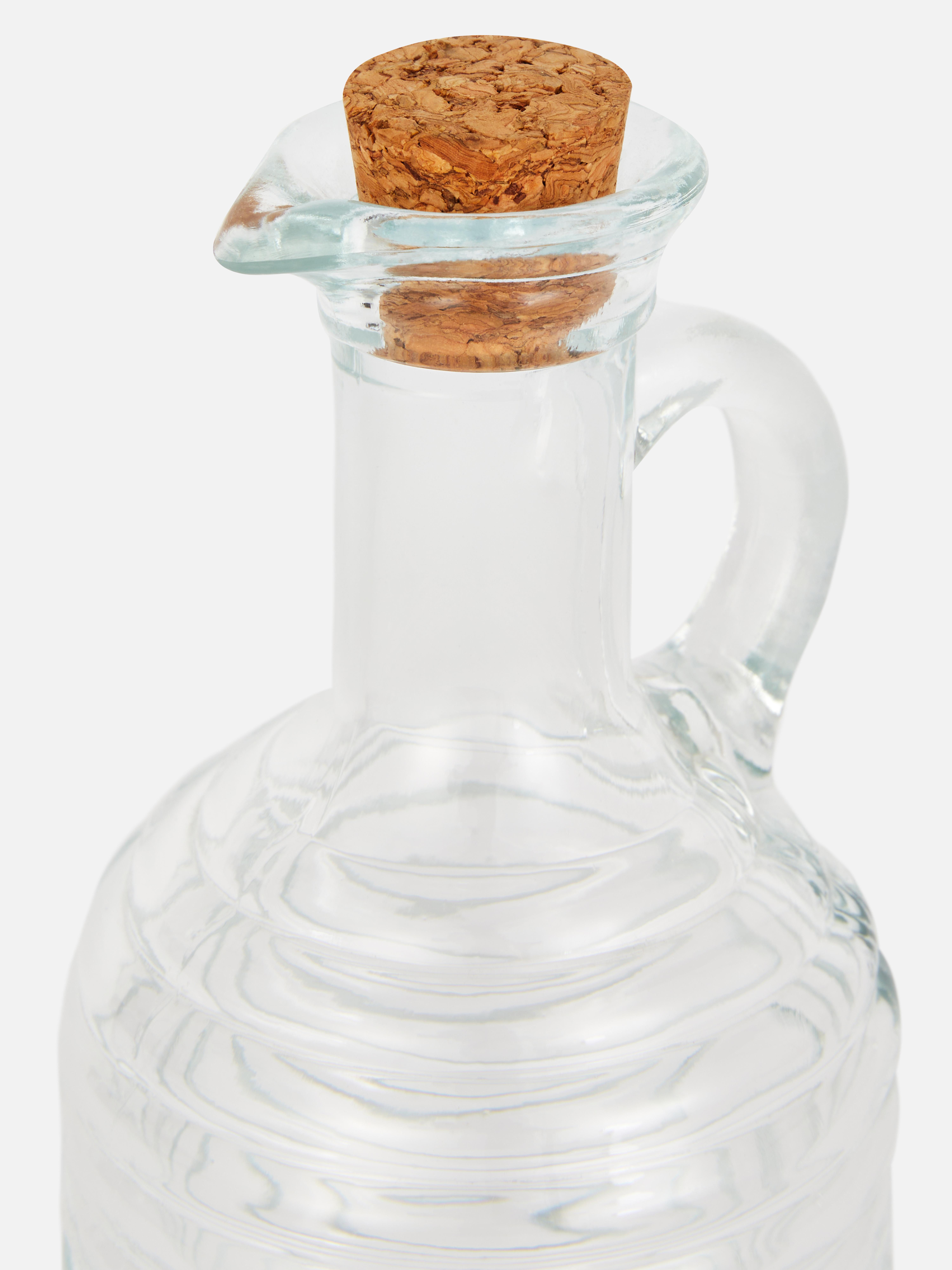 Glazen olieflesje met ribbels