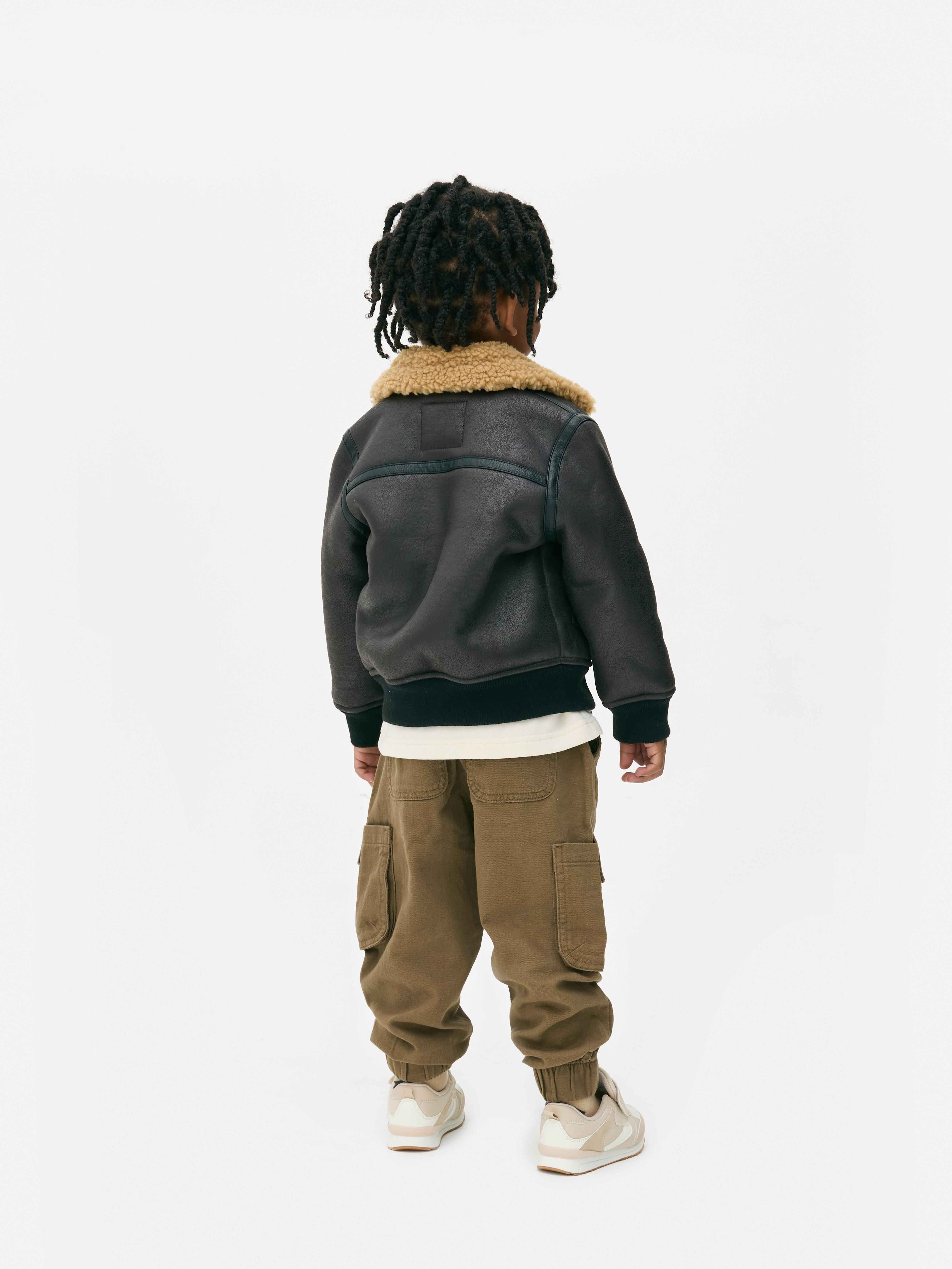 18 mois–7 ans | Veste en simili cuir à col effet mouton retourné
