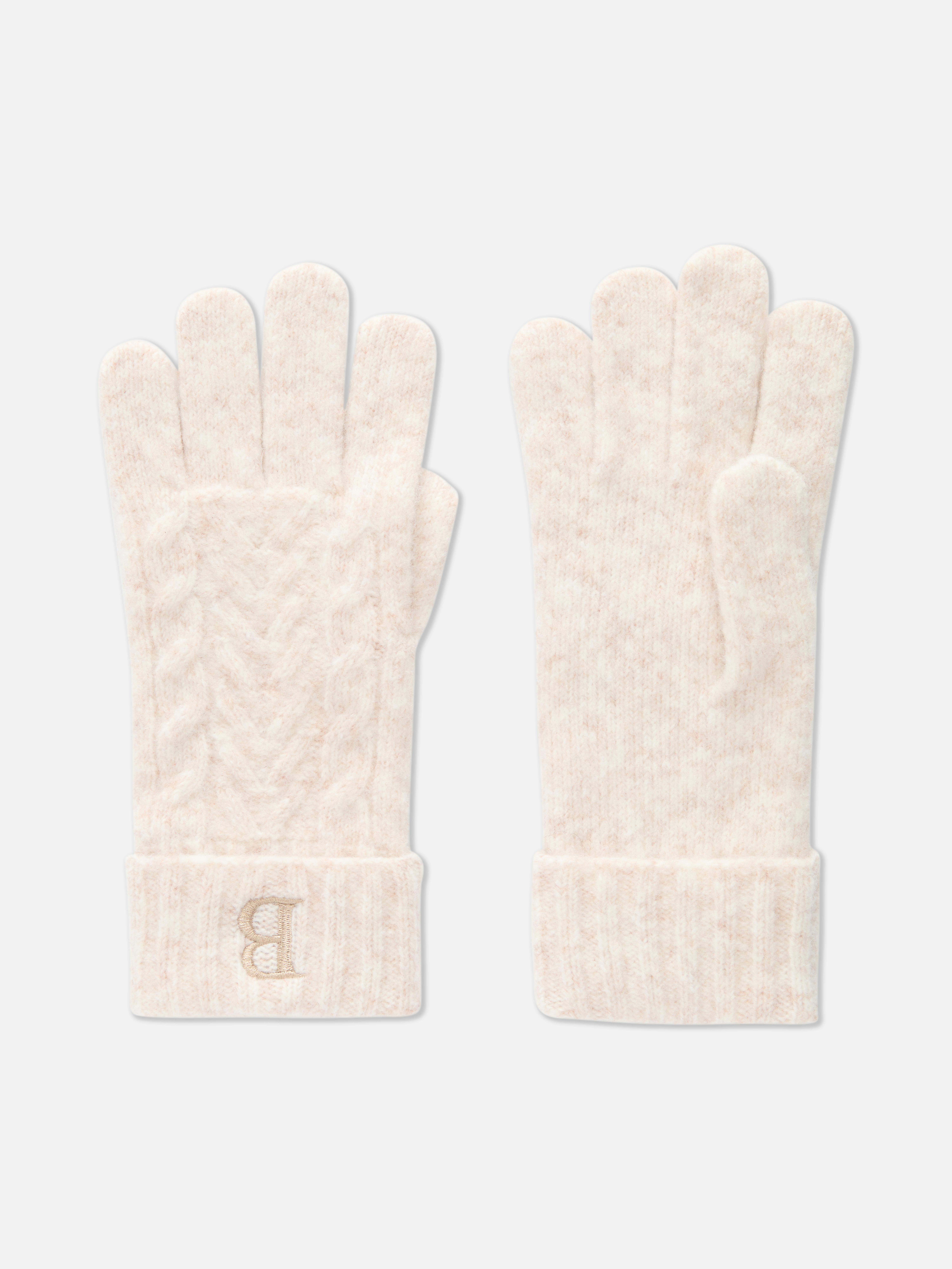 Gants en maille torsadée à initiale Rita Ora