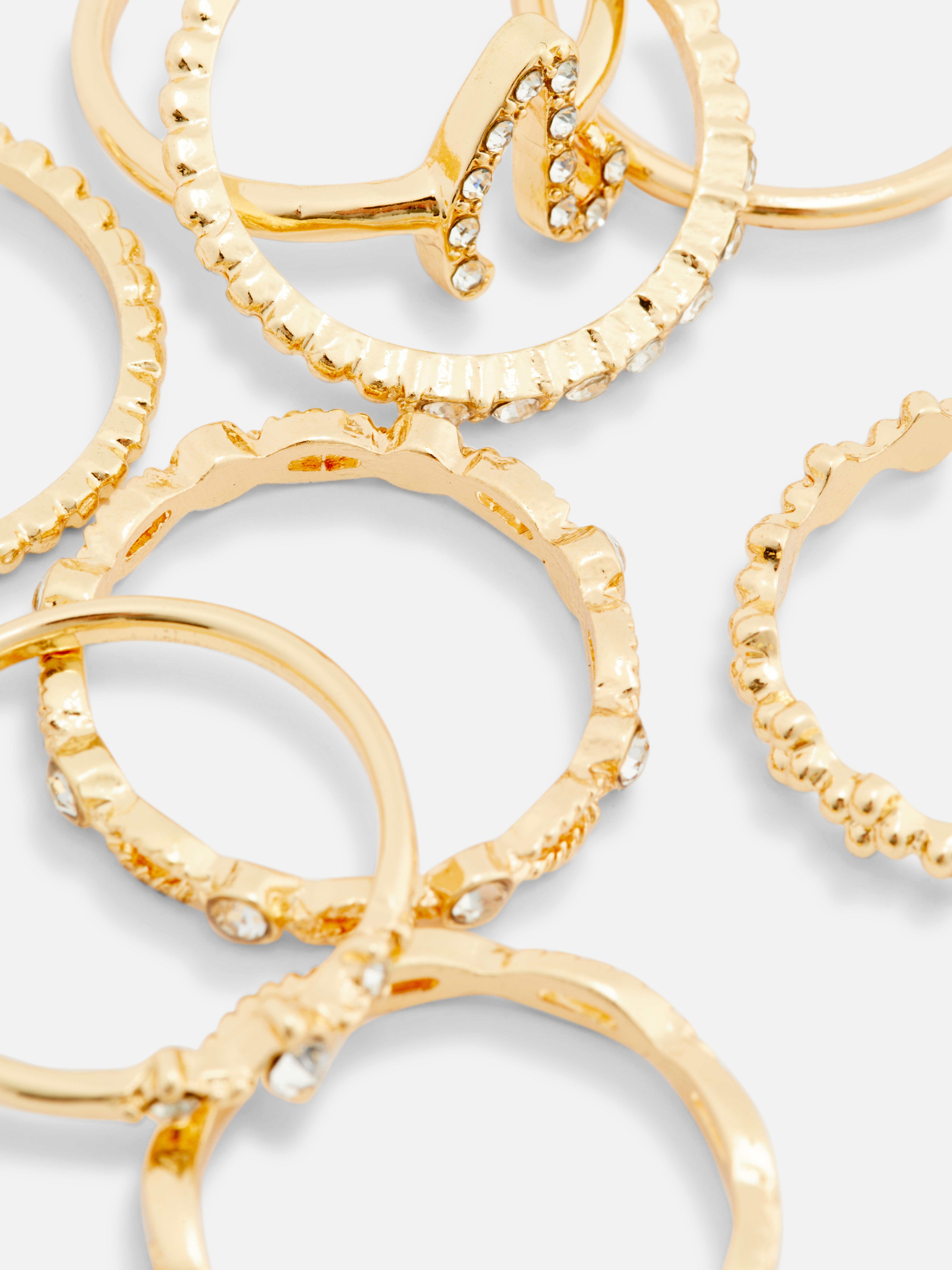 Ringen met initiaal en stras, set van 8