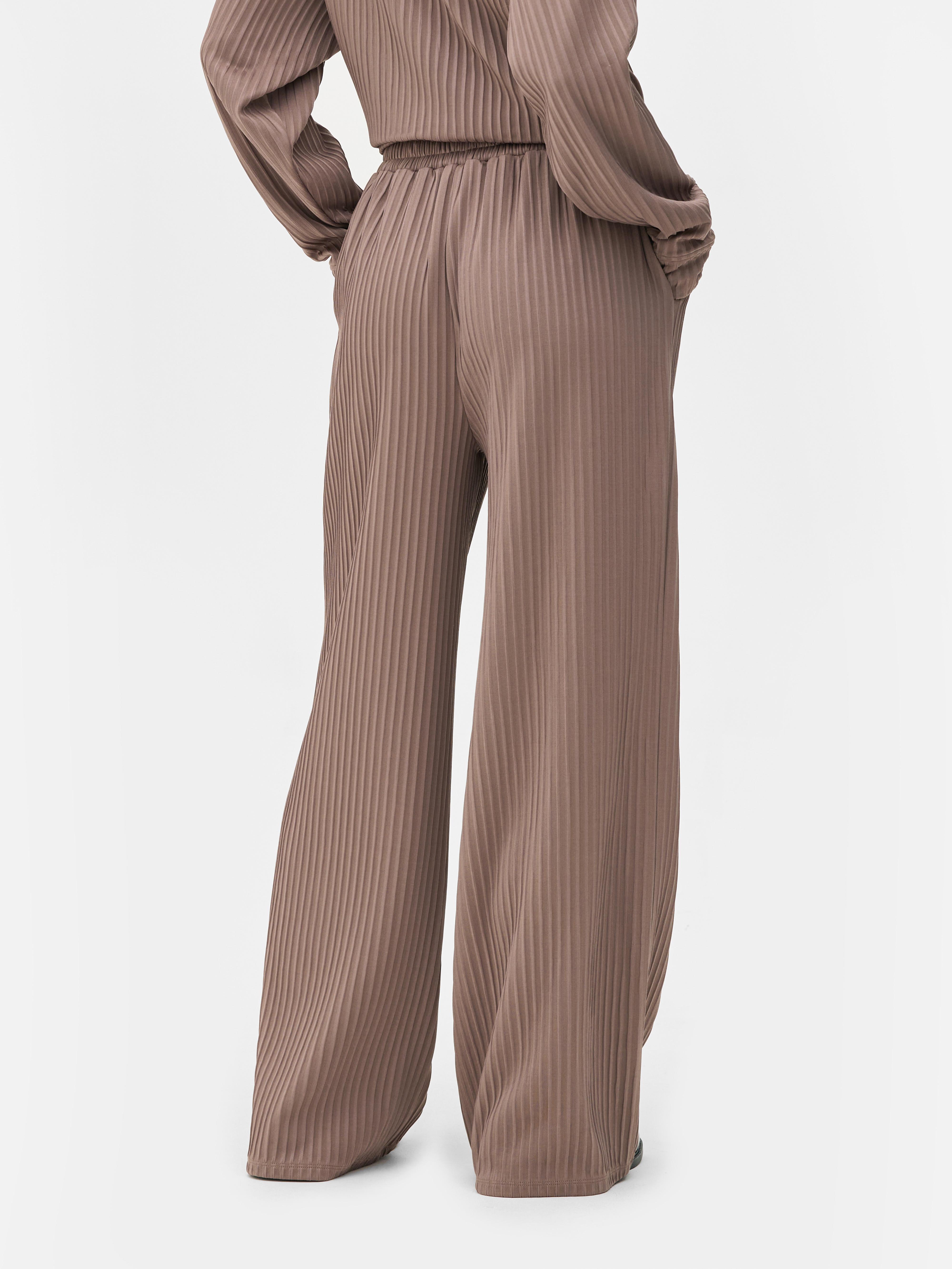Geribde broek met wijde pijpen The Edit