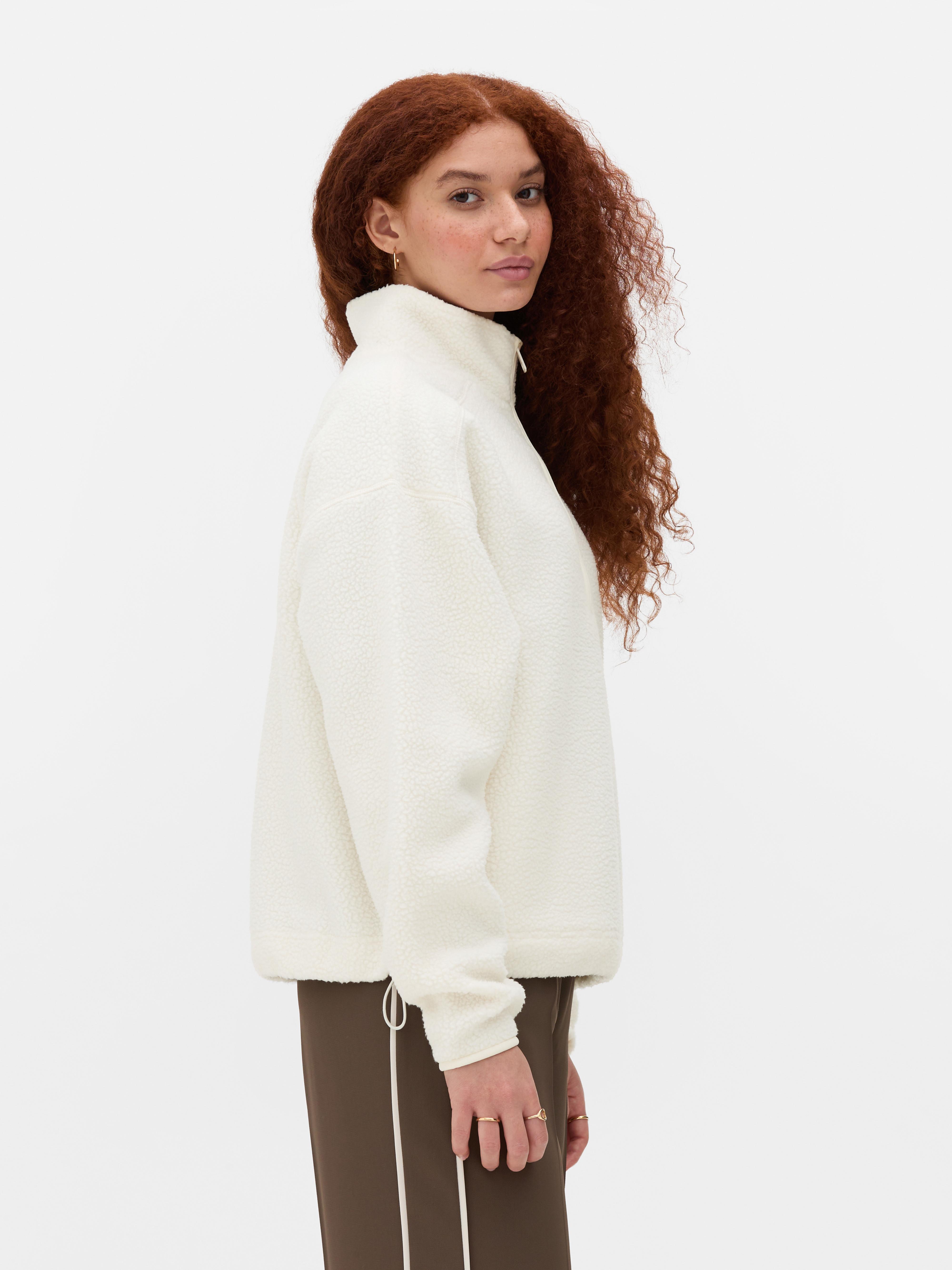 Fleece van borgstof met halve rits
