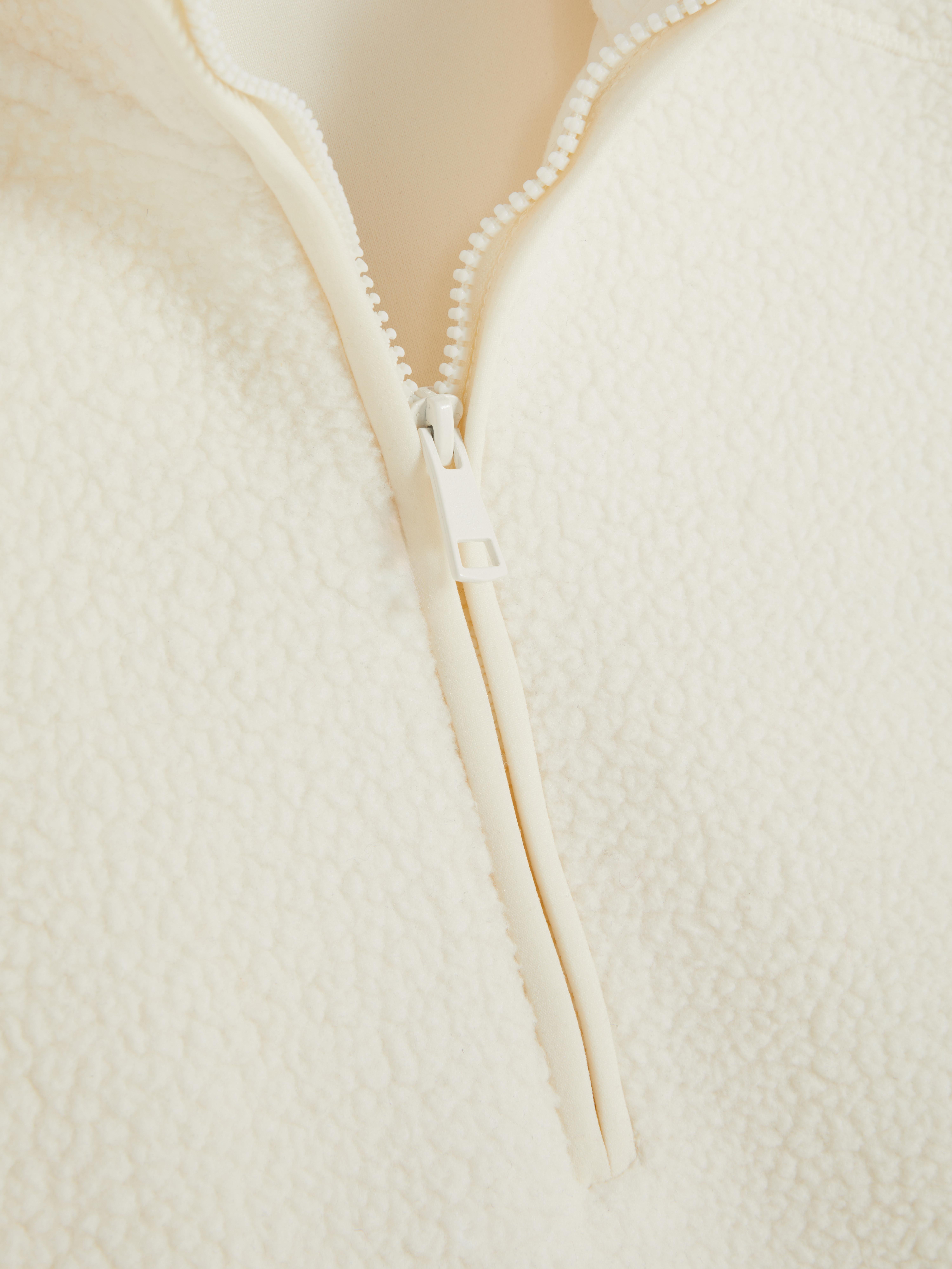 Fleece van borgstof met halve rits