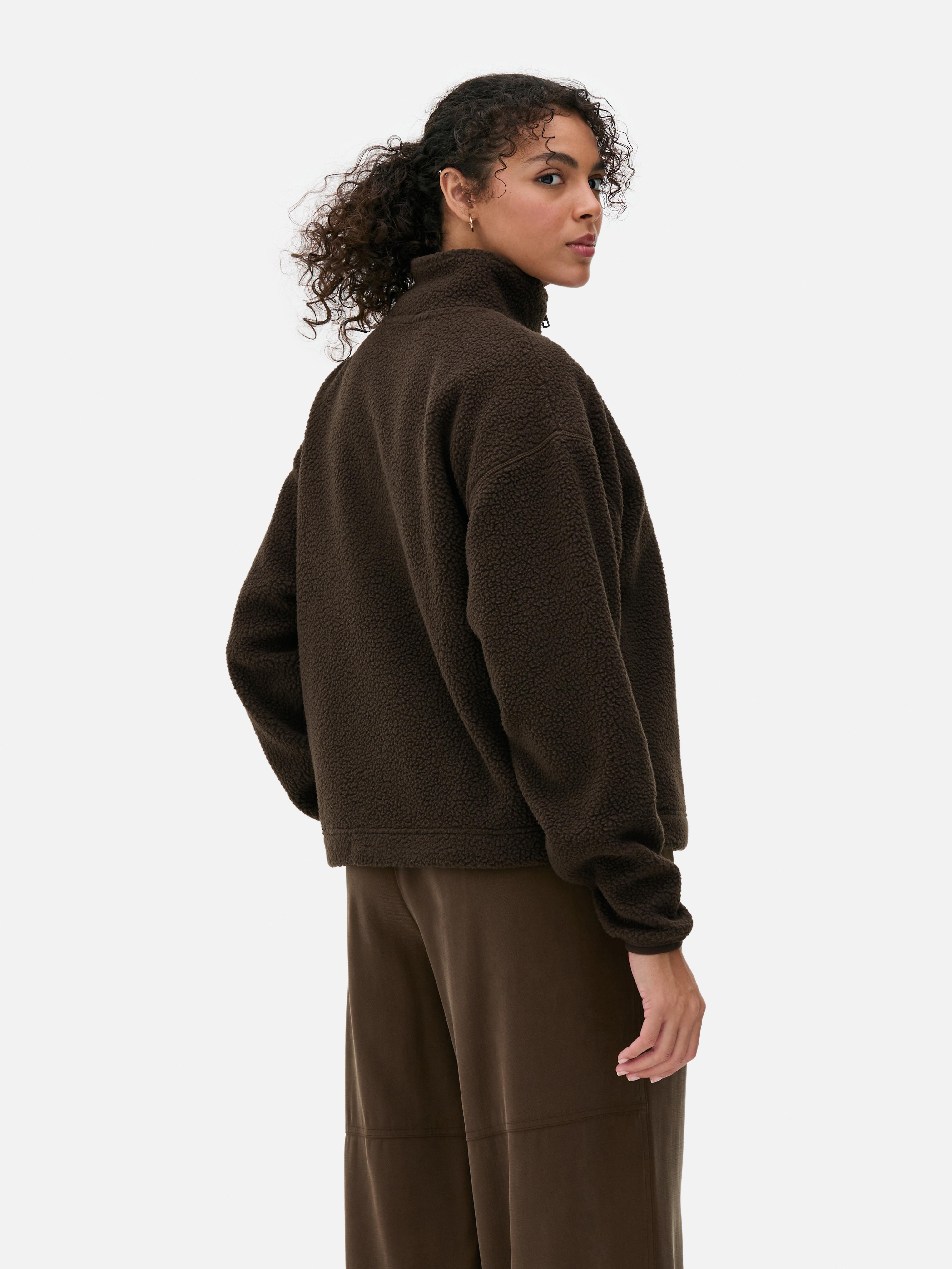Fleece van borgstof met halve rits
